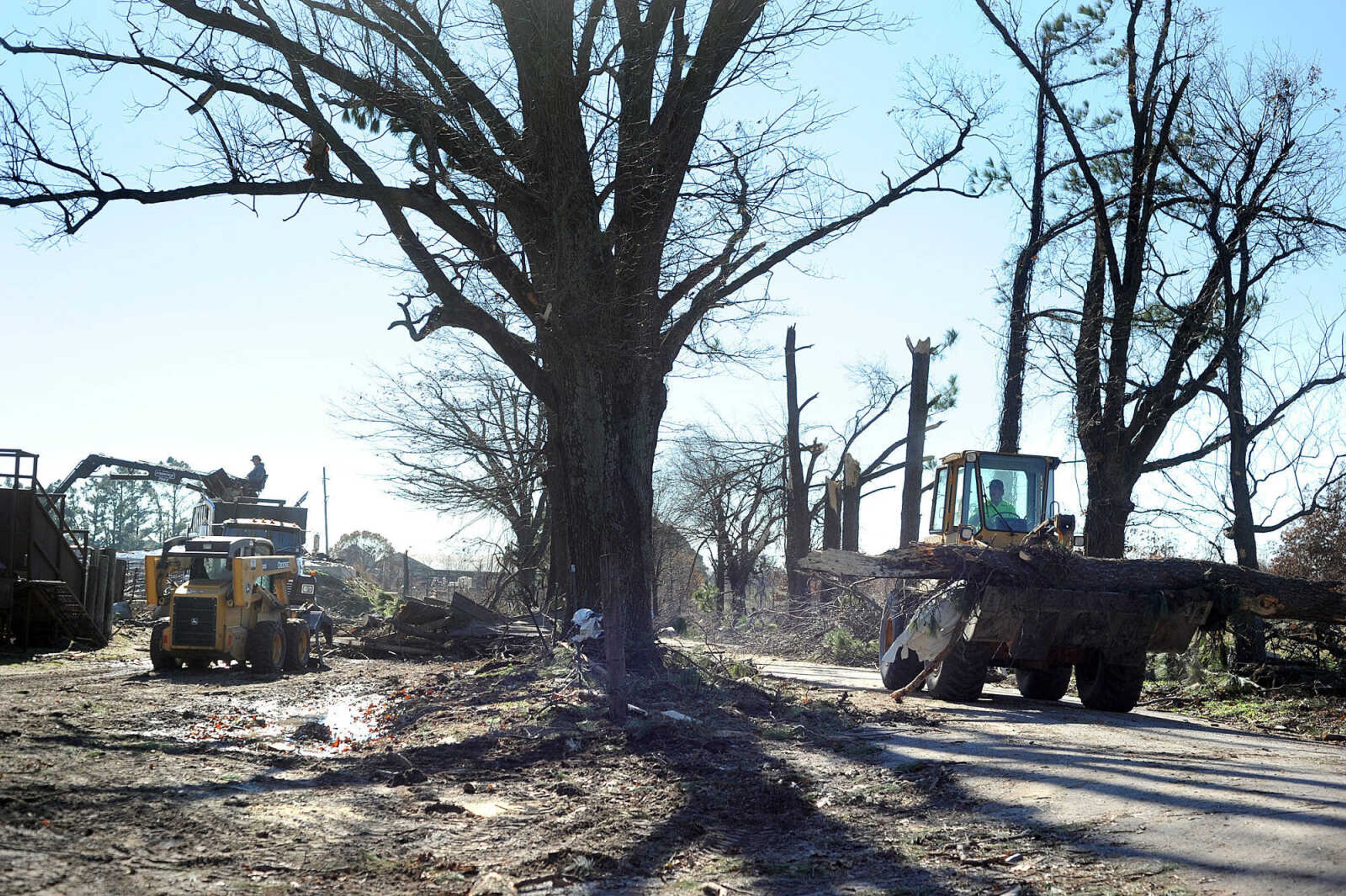 LAURA SIMON ~ lsimon@semissourian.com

Cleanup efforts from Sunday's storm are underway at Vince Draper's cattle farm, Monday, Nov. 18, 2013, southeast of Morley, Mo.