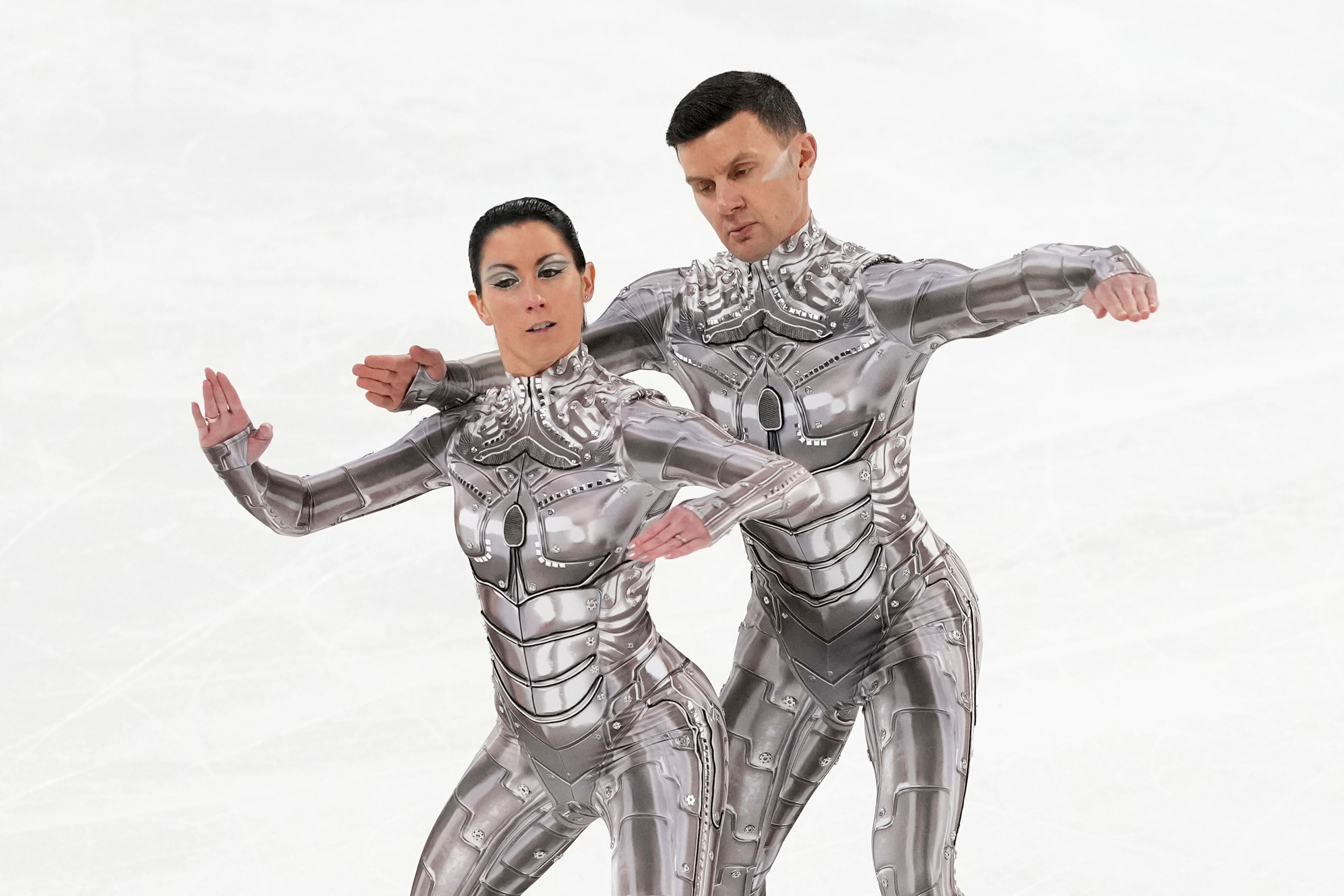 Charlene Guignard and Marco Fabbri, of Italy, compete in the ice dance's free dance segment at the ISU Grand Prix of Figure Skating, Saturday, Nov. 2, 2024, in Angers, France. (AP Photo/Aurelien Morissard)