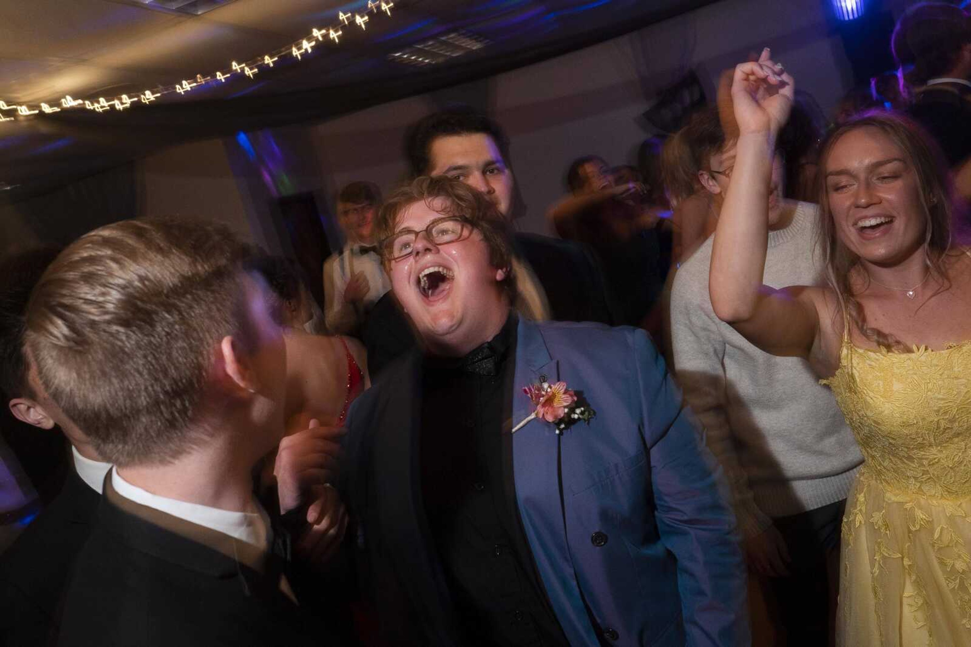 Brandon Thurm, center, hollers on the dance floor during the Saxony Lutheran prom Saturday, April 26, 2021, at  the Elks Lodge in Cape Girardeau.