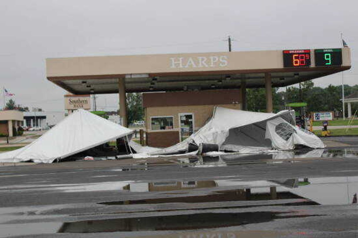 The remains of a large tent in the Harps parking lot in Dexter.