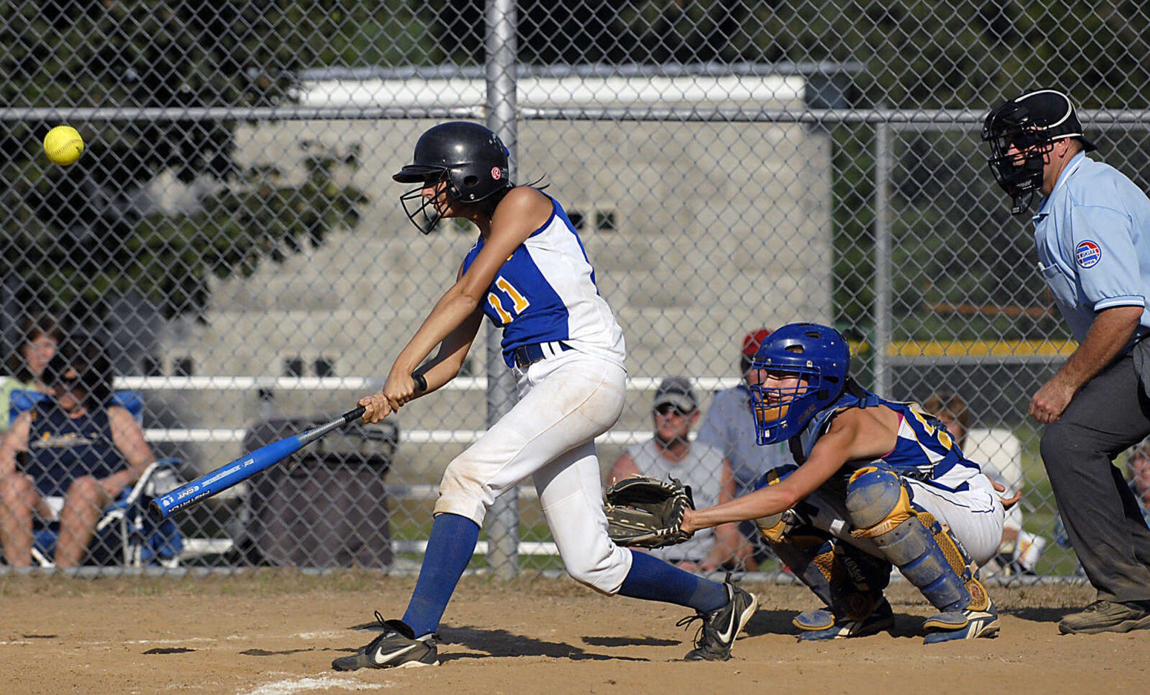 KIT DOYLE ~ kdoyle@semissourian.com
Oran's Shelbie Seyer connects for a game-ending RBI single to shallow left left against St. Vincent Tuesday afternoon, August 25, 2009, in Oran.  Oran won 13-3, ending in the fifth inning.