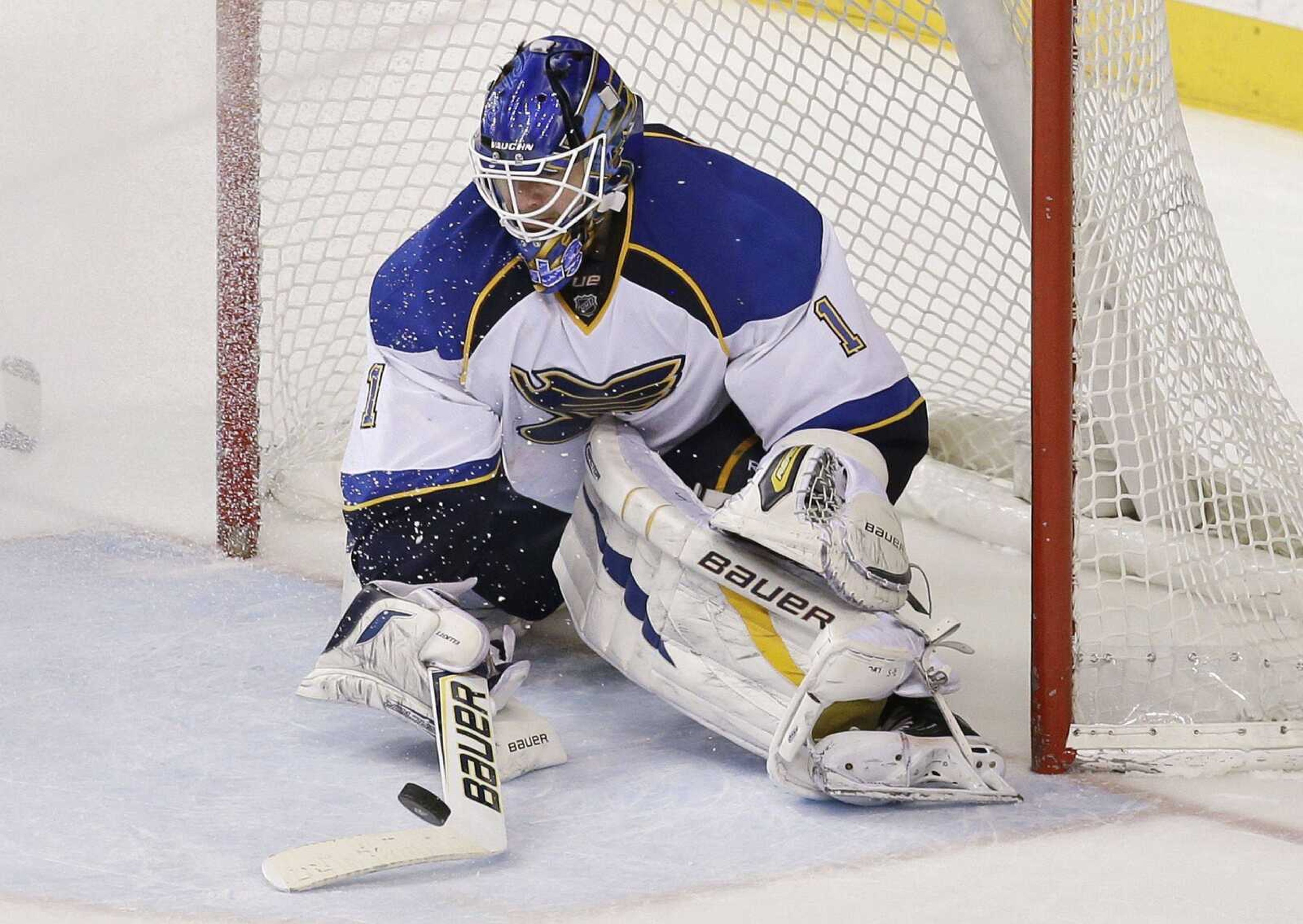 Blues goalie Brian Elliott blocks a shot against the Predators in the third period Tuesday in Nashville, Tenn. (Mark Humphrey ~ Associated Press)