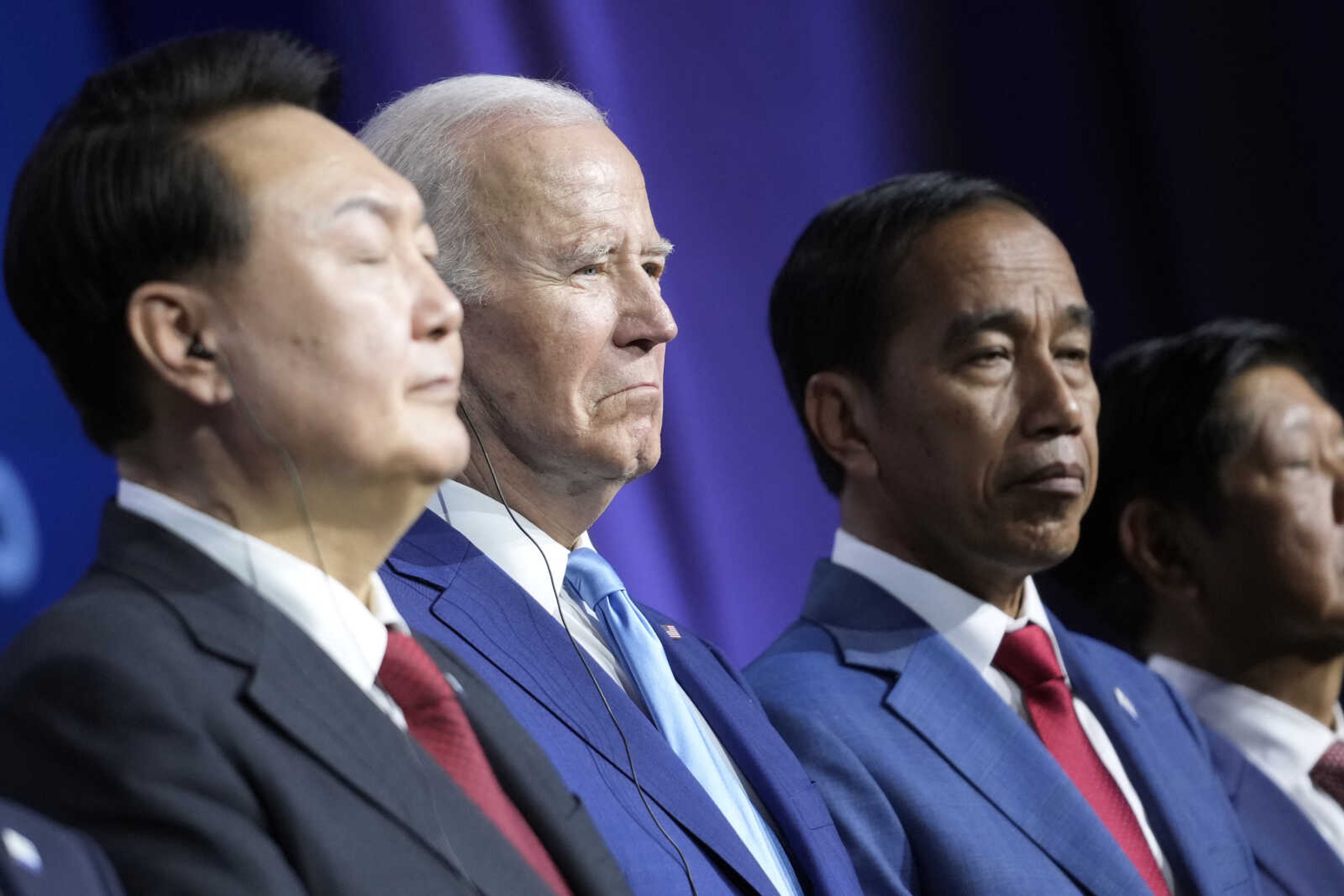 Japan's Prime Minister Kishida Fumio, President Joe Biden and Indonesia's President Joko Widodo listen after the Indo-Pacific Economic Framework family photo at the Asia-Pacific Economic Cooperation summit, Thursday, Nov. 16, 2023, in San Francisco. (AP Photo/Godofredo A. VÃ¡squez)