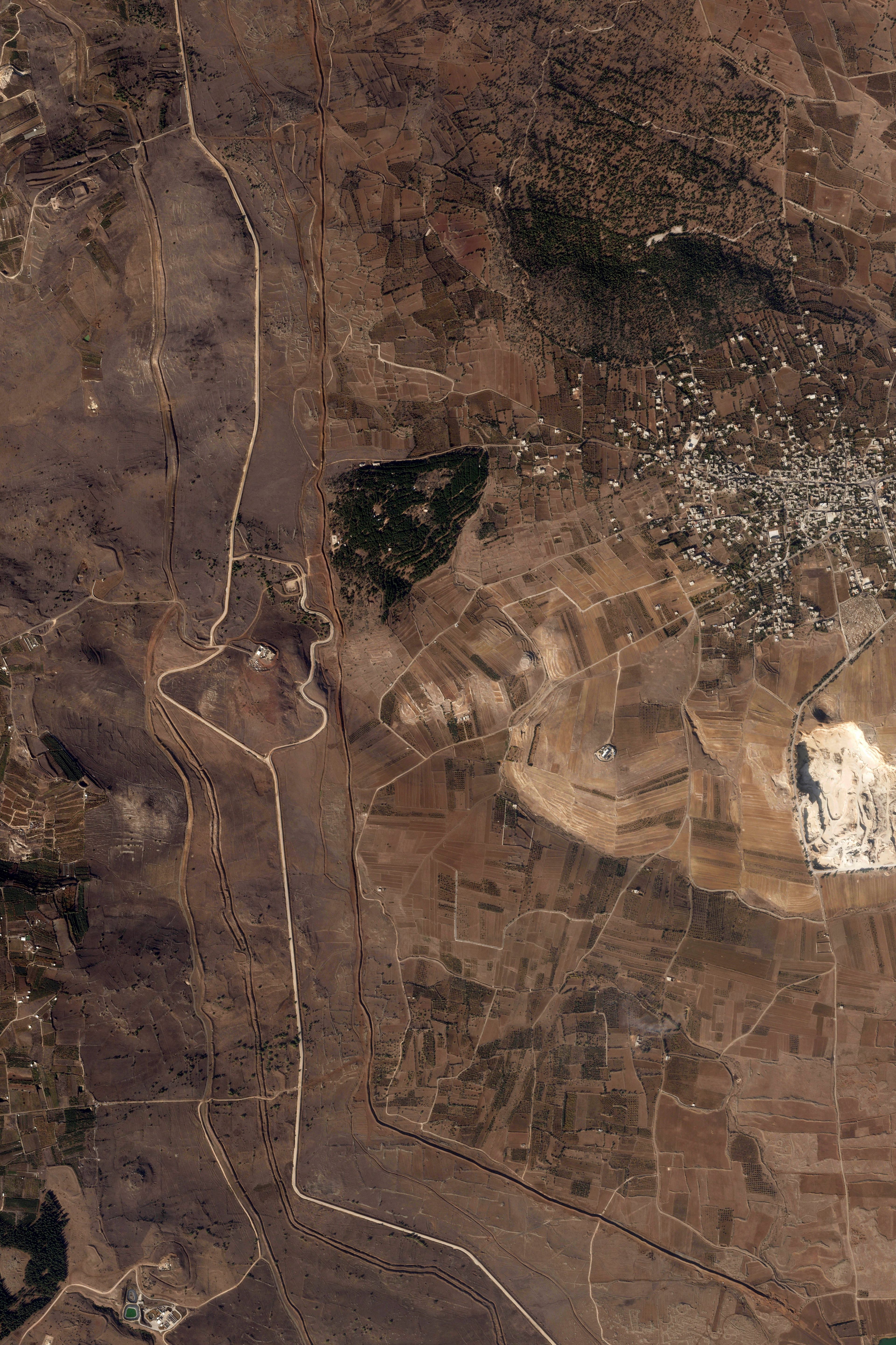 This satellite image from Planet Labs PBC shows Israeli work along the Alpha Line separating the Israeli-occupied Golan Heights from a demilitarized zone in Syria patrolled by United Nations forces on Nov. 5, 2024. (Planet Labs PBC via AP)