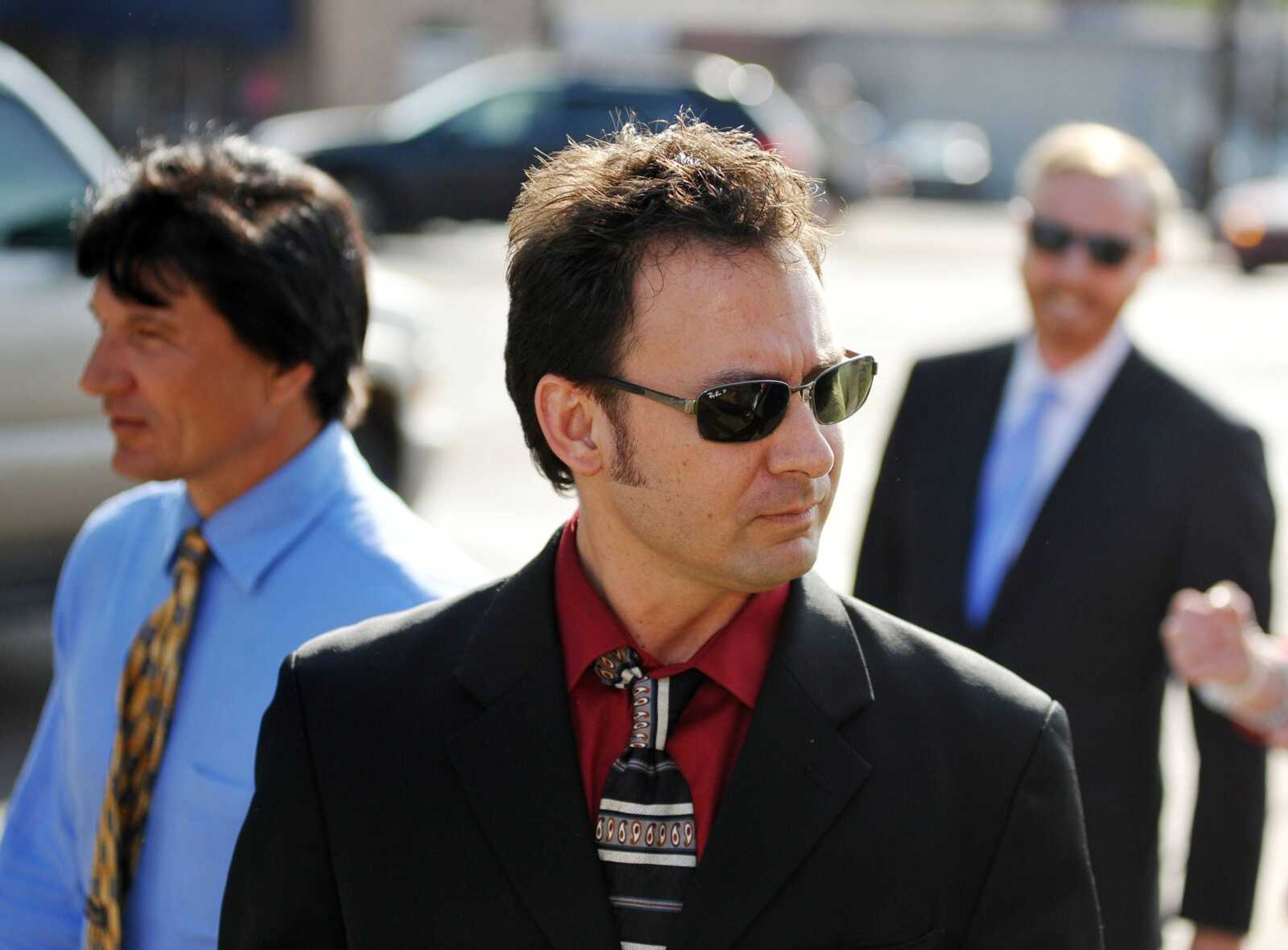 Paul Kevin Curtis, who had been in custody under the suspicion of sending letters which tested positive for ricin to U.S. President Barack Obama and U.S. Sen. Roger Wicker, R-Miss., walks to a press conference in Oxford, Miss. on Tuesday, April 23, 2013. The charges were dismissed without prejudice, which means they could be re-instated if prosecutors so choose. (AP Photo/Oxford Eagle, Bruce Newman)