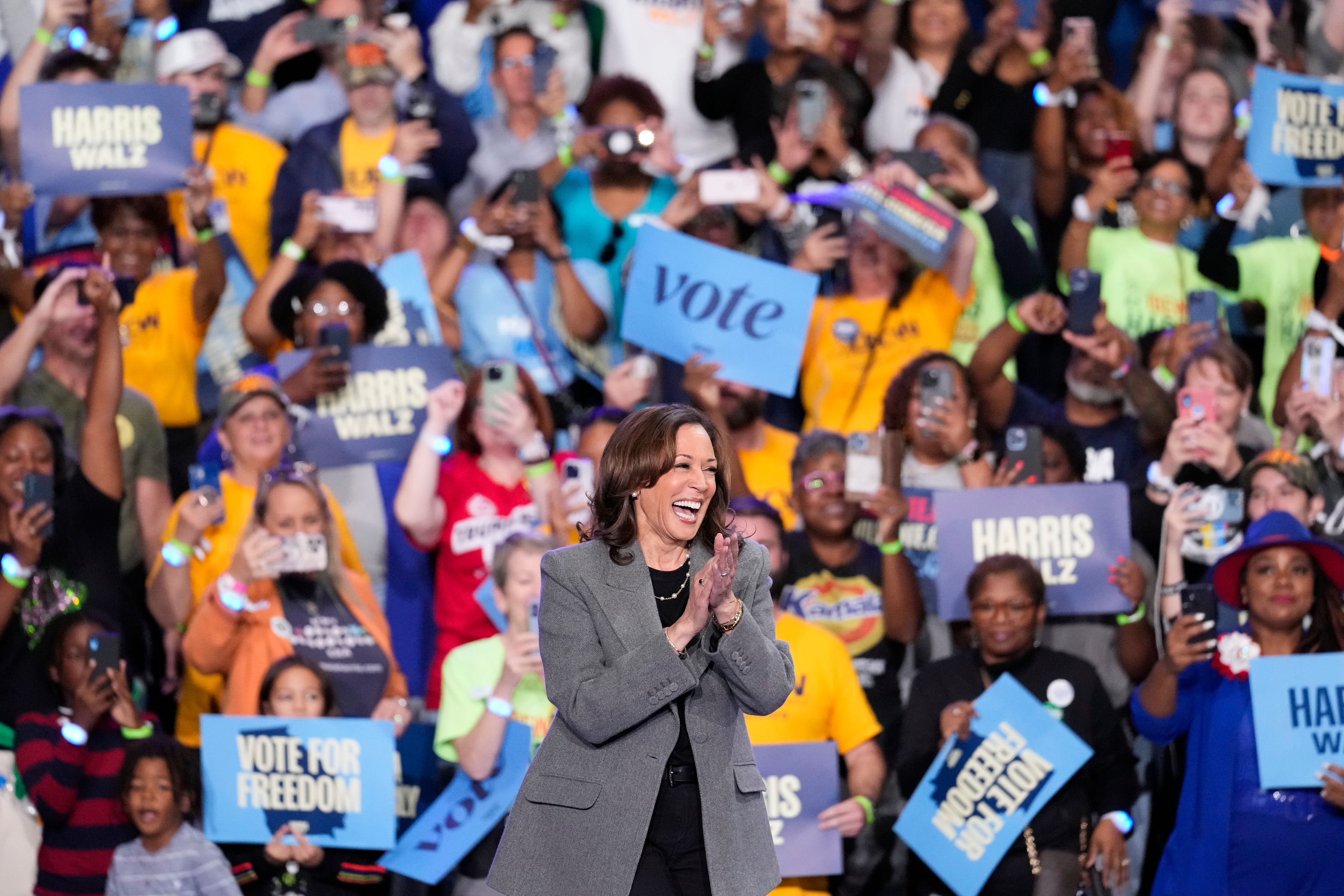 Democratic presidential nominee Vice President Kamala Harris reacts to the crowd during a campaign event at Lakewood Amphitheatre, Saturday, Oct. 19, 2024, in Atlanta. (AP Photo/Brynn Anderson)