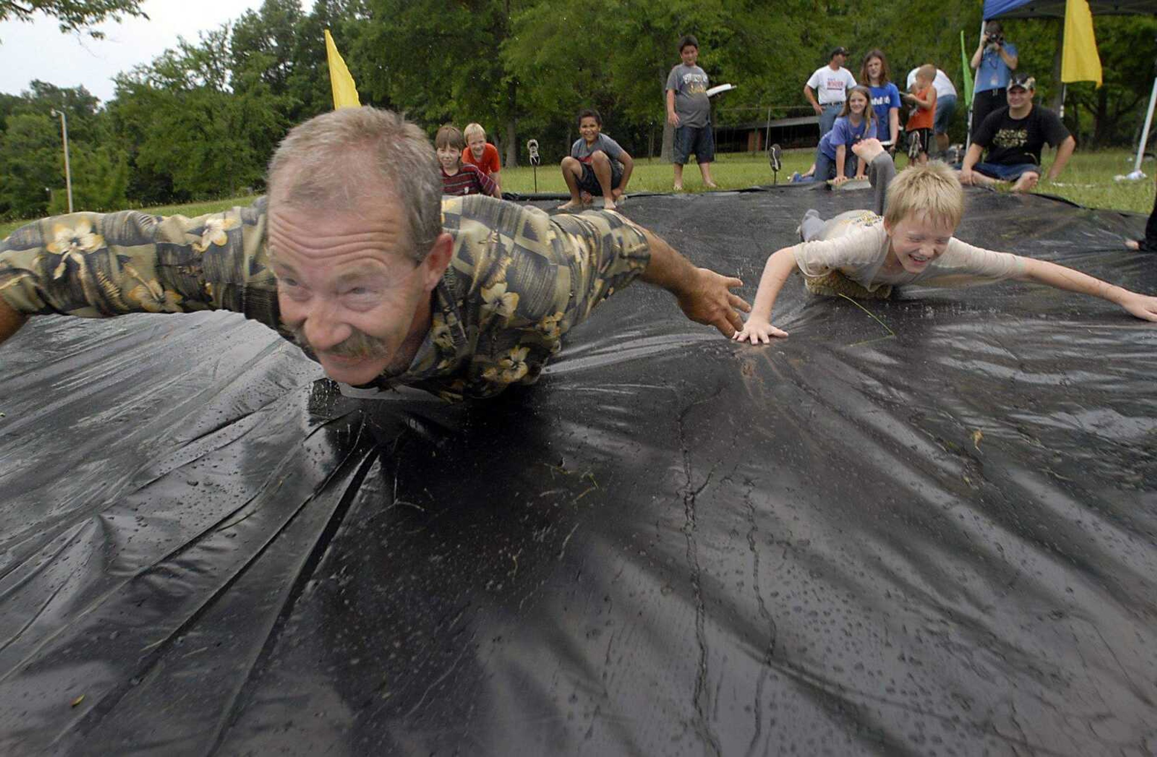 KIT DOYLE ~ kdoyle@semissourian.com
Jack Watt, left, and Landon Thomsen ice block racing Saturday, June 28, 2008, at Pellegrino Park in Marble Hill.