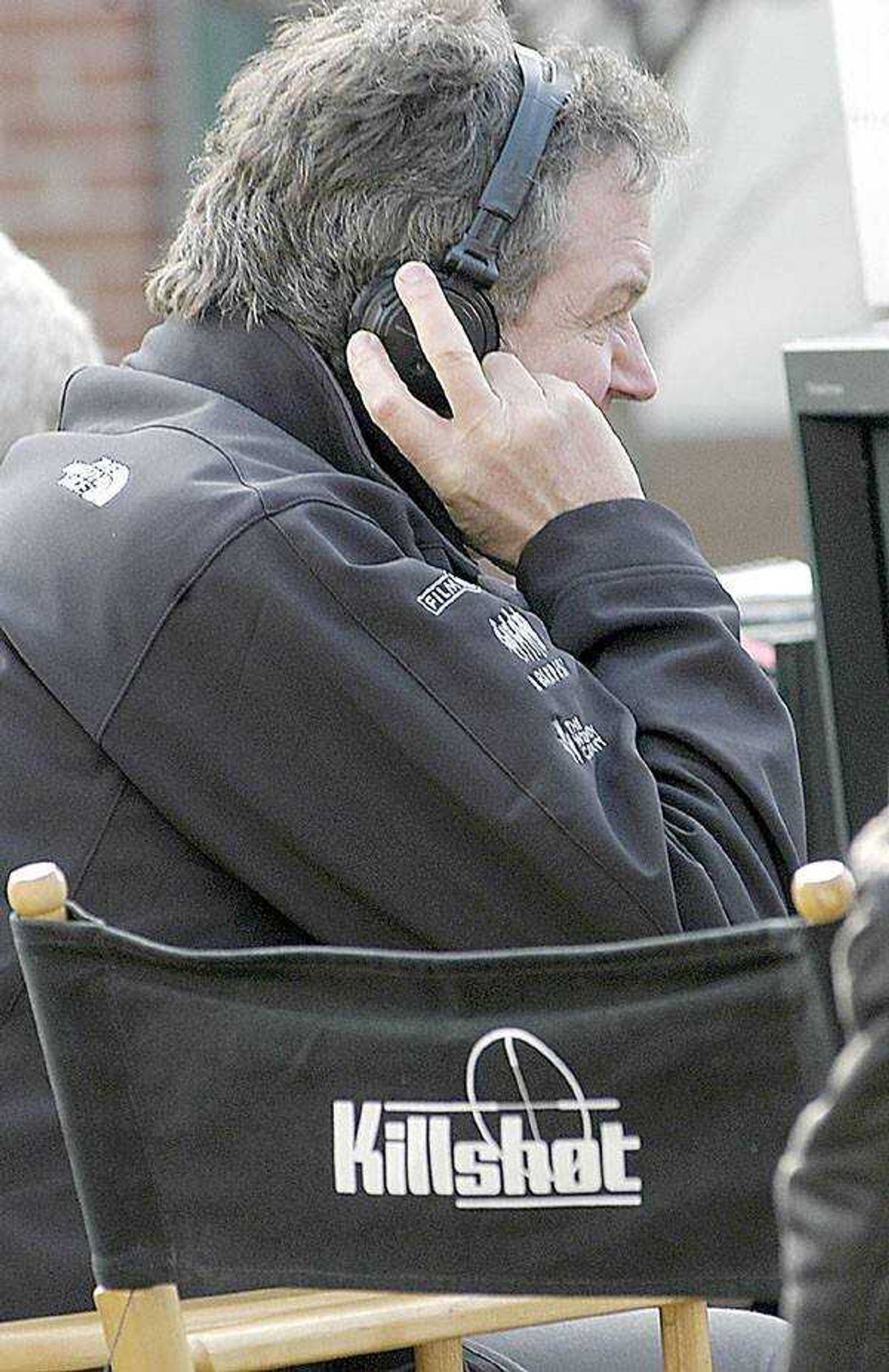 John Madden, director of the Academy-Award winning "Shakespeare in Love,"  listened to the audio during the filming of "Killshot" at the bottom of the Cape Girardeau's Common Pleas Courthouse steps Monday.