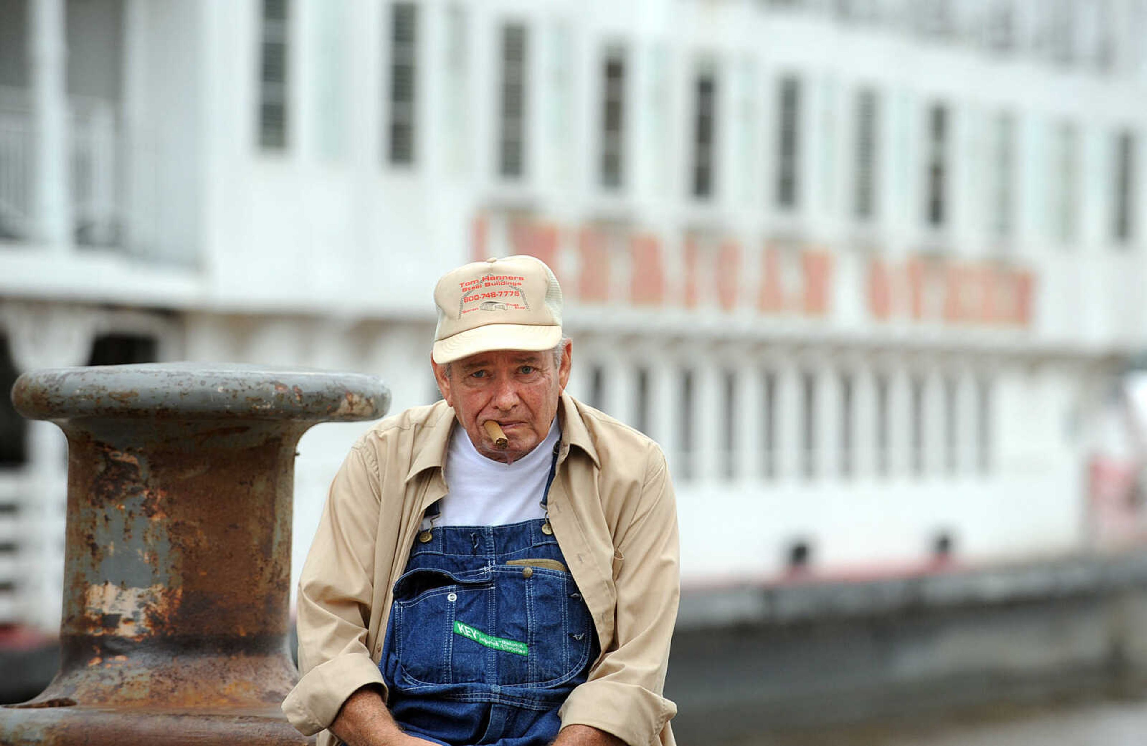 LAURA SIMON ~ lsimon@semissourian.com

A gentleman puffs on a cigar as the American Queen riverboat docks in Cape Girardeau, Tuesday, July 2, 2013.