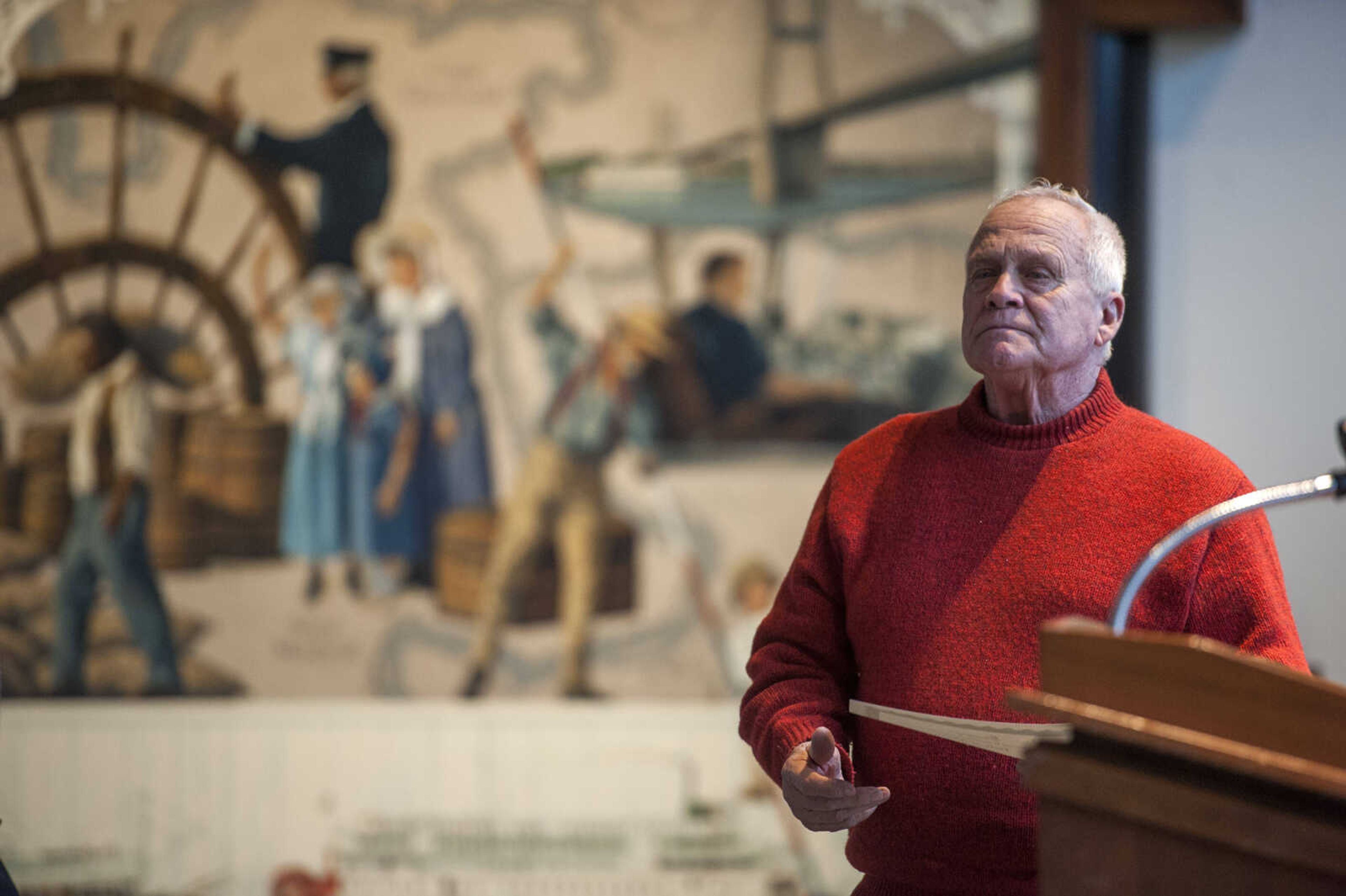 Ed Smith, who taught sculpture at Southeast Missouri State University and who began the high school exhibitions, prepares to hand out the Best in Show award during the 41st annual Exhibiting Excellence high school art exhibit at the Crisp Museum at Southeast Missouri State University's River Campus Sunday, Feb. 10, 2019.