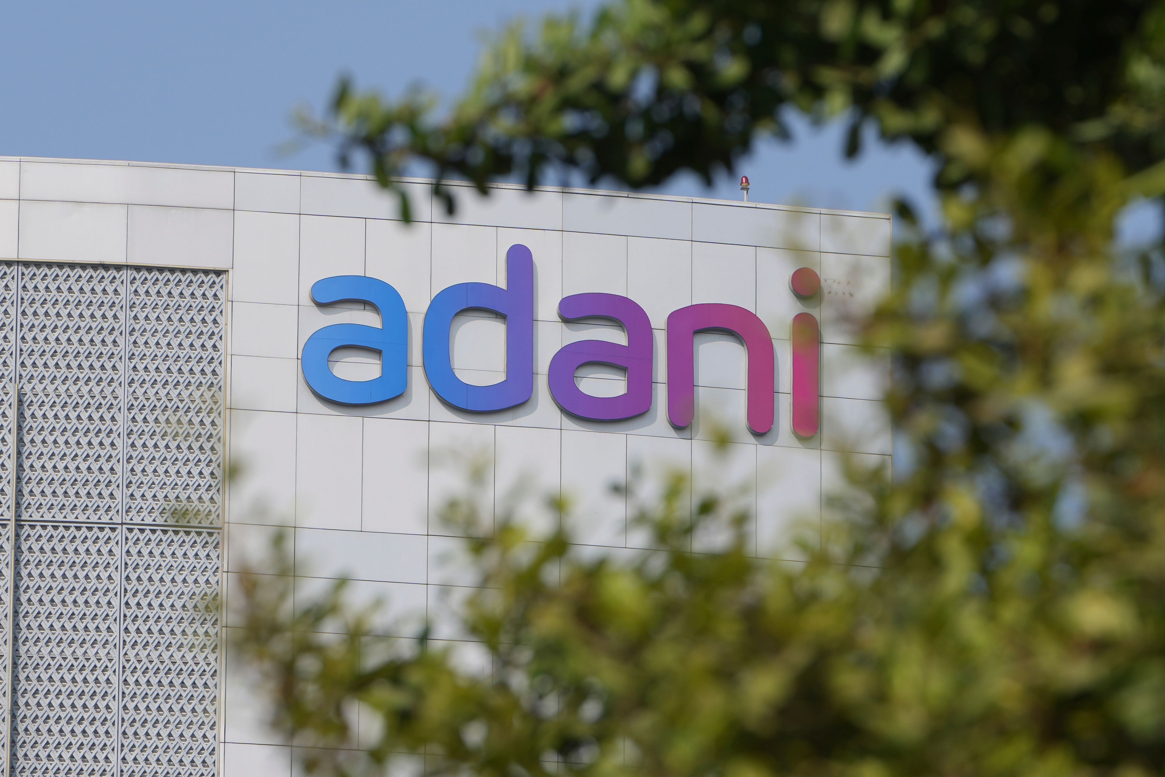 Adani's signage is seen on the facade of Adani's corporate house in Ahmedabad, India, Thursday, Nov. 21, 2024. (AP Photo/Ajit Solanki)