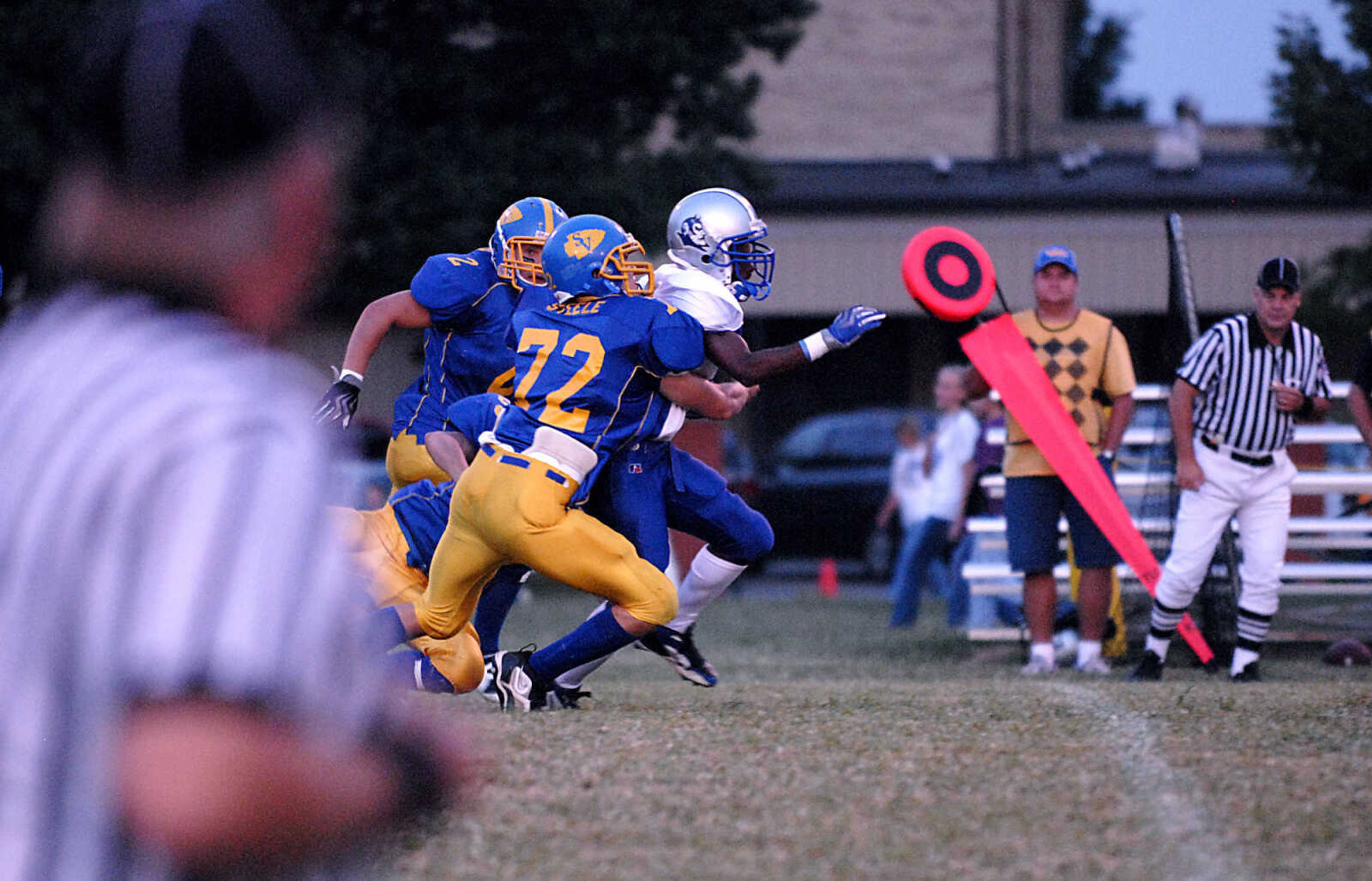 KIT DOYLE ~ kdoyle@semissourian.com
St. Vincent's James Steele tackles a Maplewood special teams returner Friday evening, September 18, 2009, in Perryville.