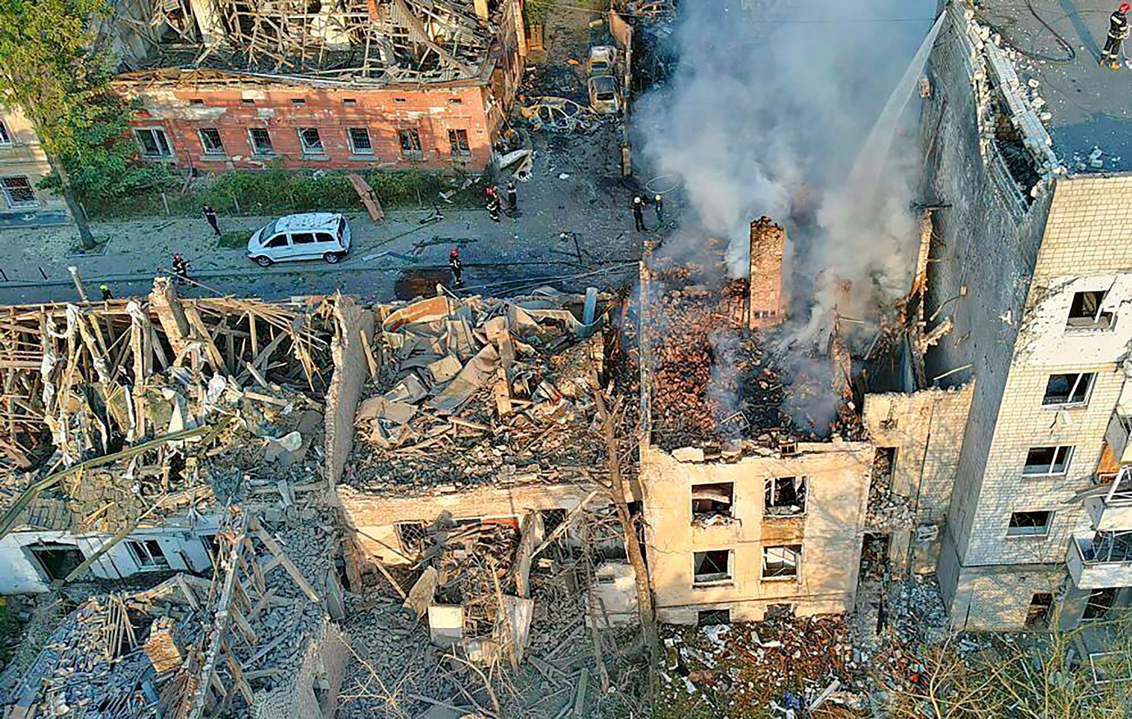 In this photo provided by the State Emergency Service of Ukraine, smoke rises from a building which was destroyed by a Russian strike in Lviv, Ukraine, Wednesday, Sept. 4, 2024.. (State Emergency Service of Ukraine via AP)