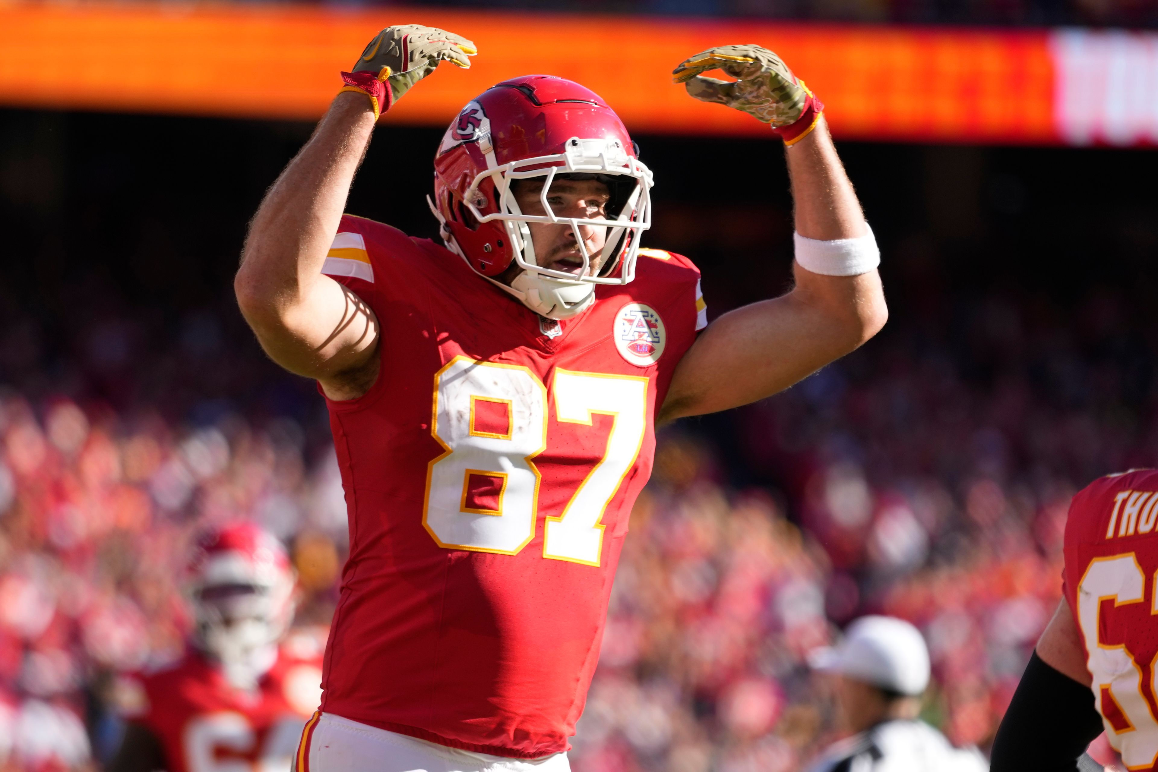 Kansas City Chiefs tight end Travis Kelce (87) celebrates after catching a touchdown pass during the first half of an NFL football game against the Denver Broncos Sunday, Nov. 10, 2024, in Kansas City, Mo. (AP Photo/Ed Zurga)