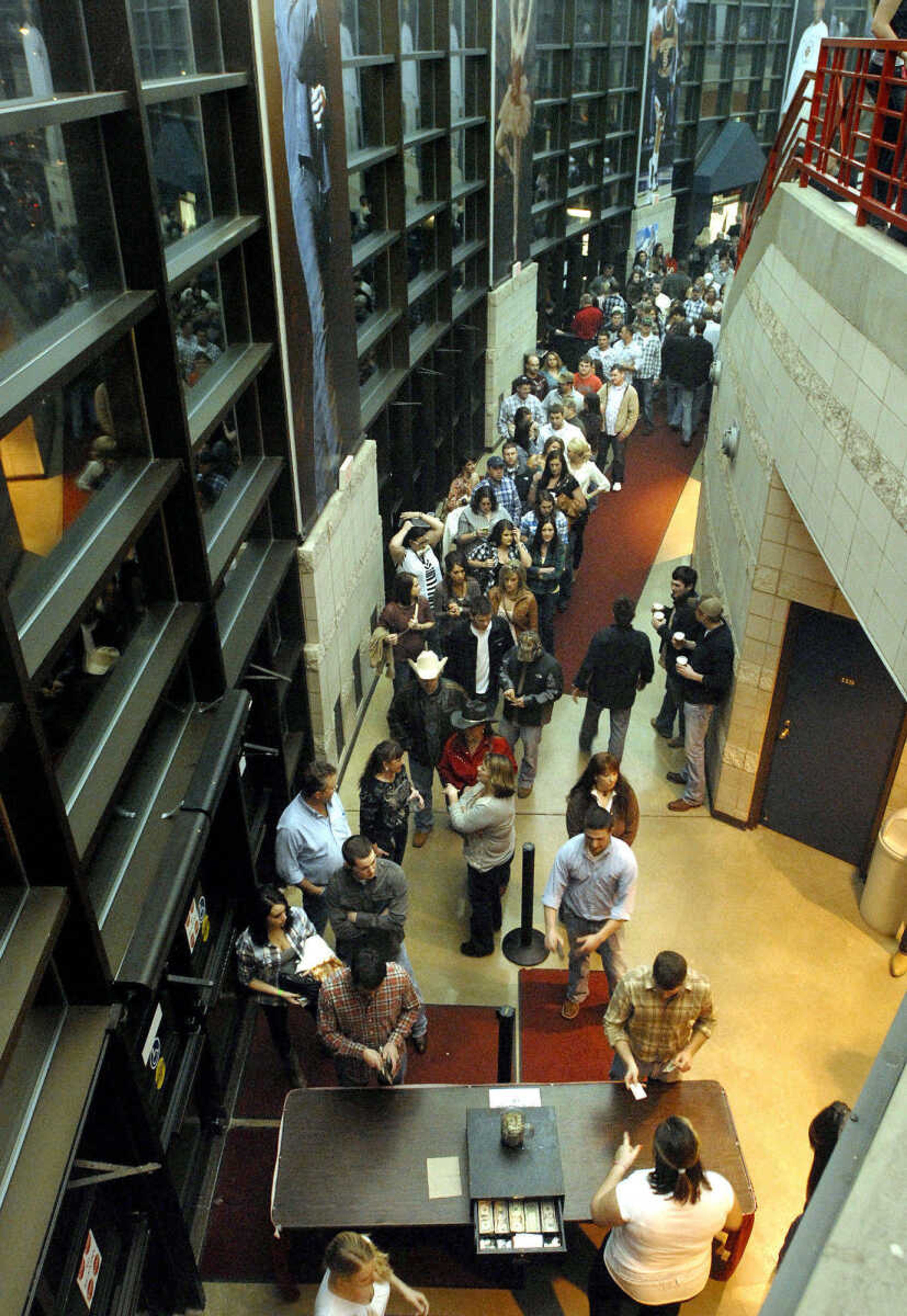 LAURA SIMON ~ lsimon@semissourian.com
The line for beer stretches around the entrance way Friday night, January 20, 2012 during the "Blood, Sweat and Beers Tour" at the Show Me Center in Cape Girardeau.