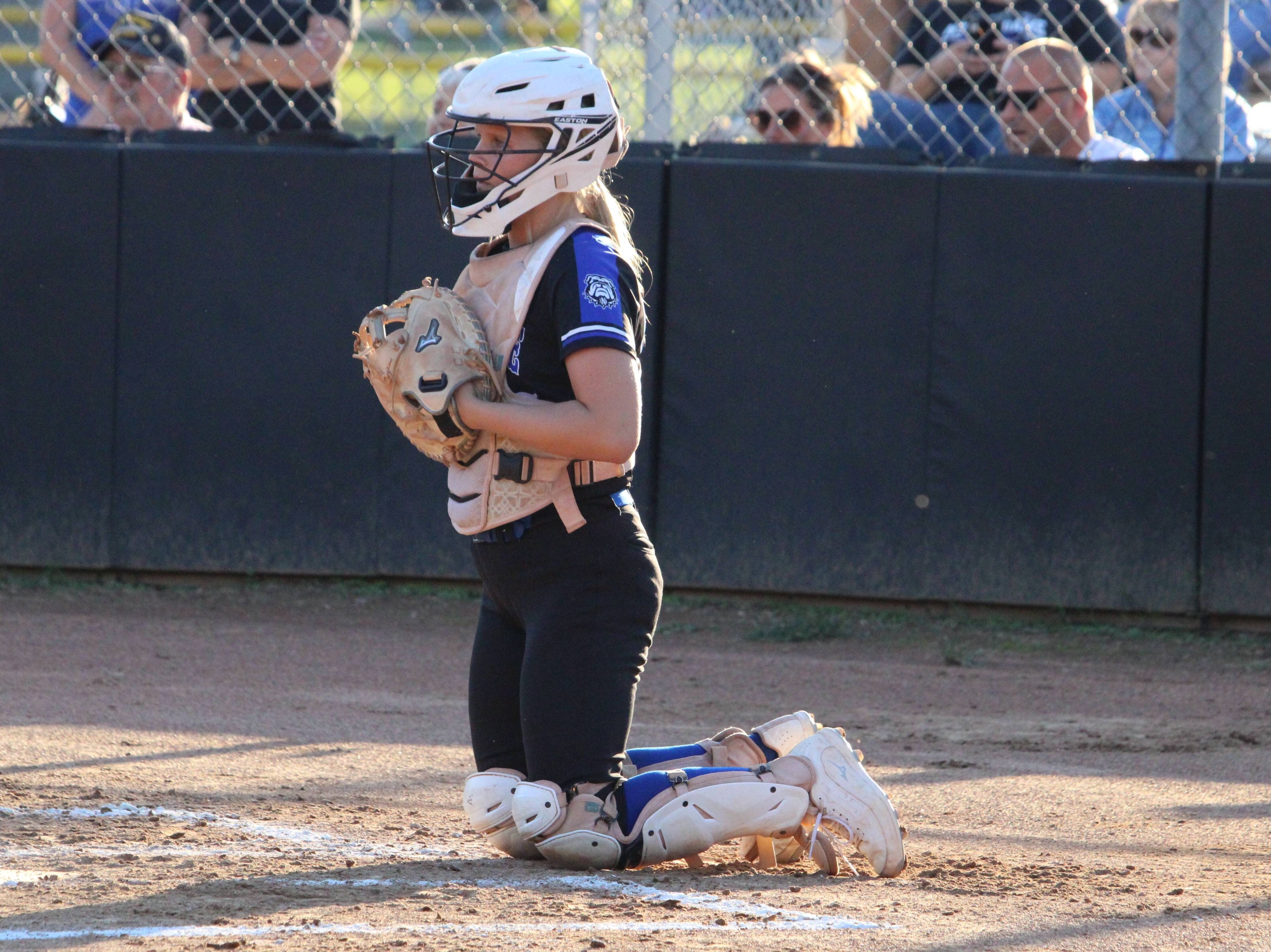 Notre Dame's Colleen Jimerson kneels behind the plate during the Thursday, September 26 game between the Bulldogs and Jackson at the Jackson City Park in Jackson, Mo. 