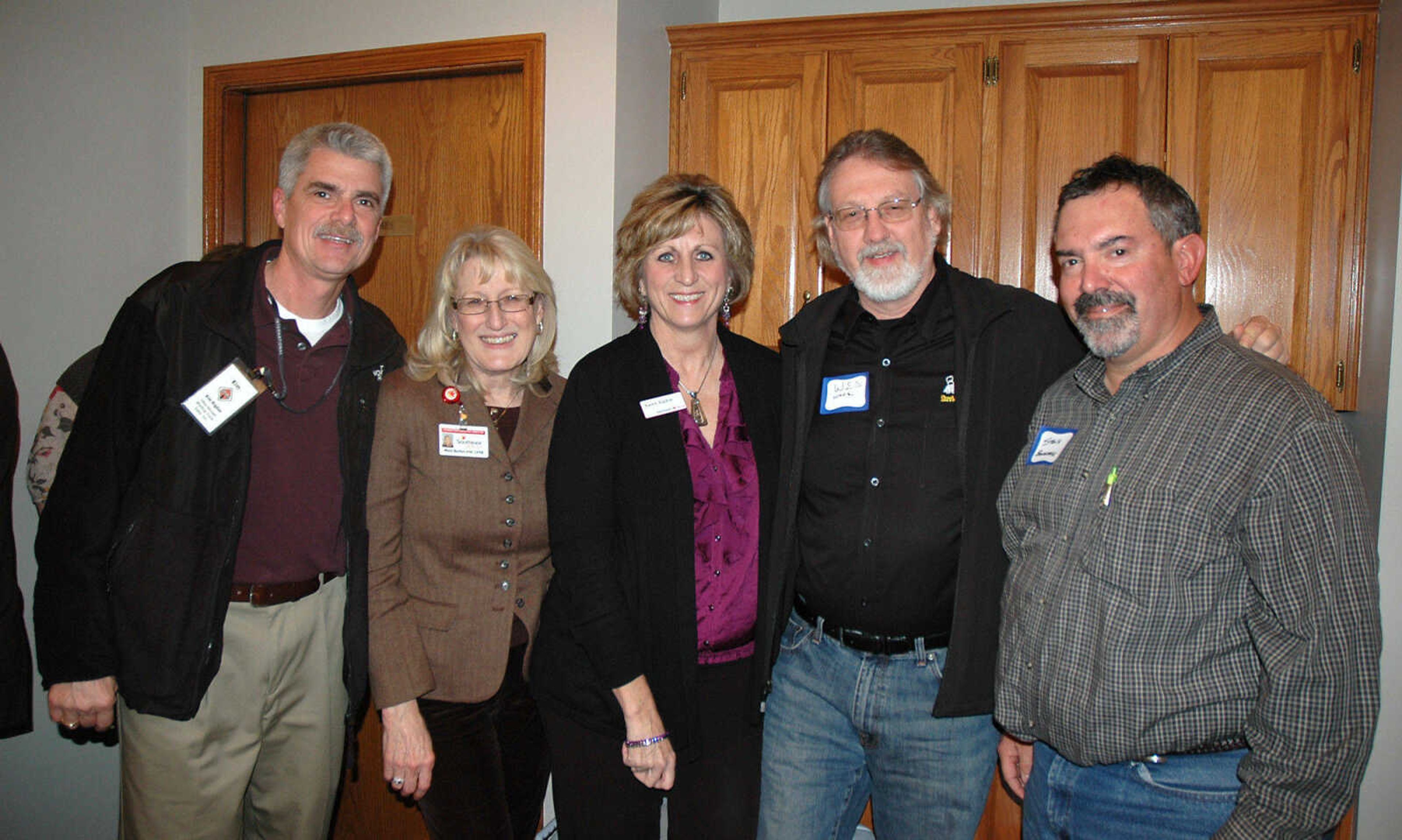 MELISSA MILLER ~ mmiller@semissourian.com

Kim Rigdon, Mary Burton Hitt, Karen Rigdon, Wes Wade and Steven Skelton, from left, at Jackson Area Chamber of Commerce Business After Hours on Jan. 10, 2012, at Baer & Edington LLC.