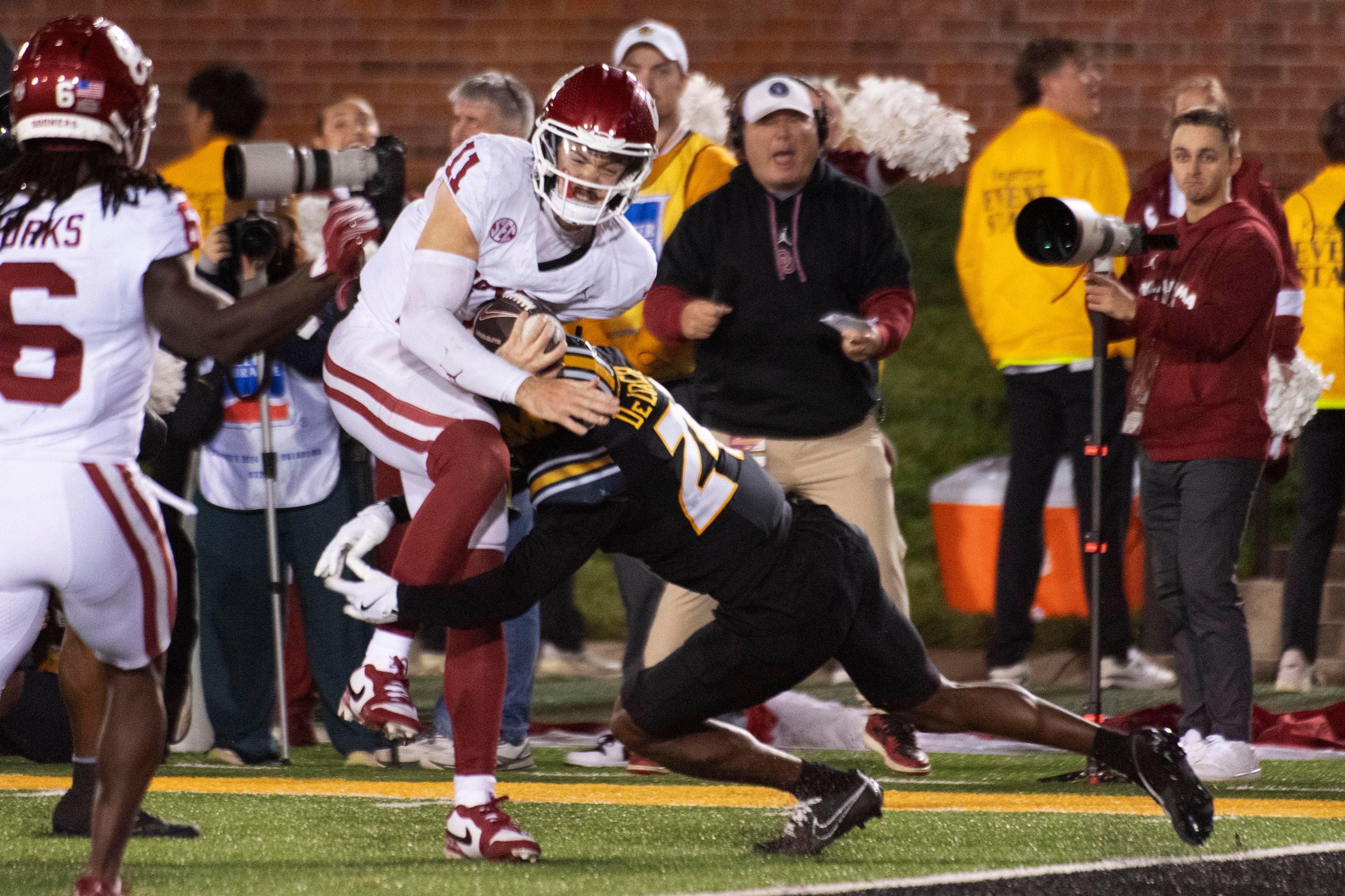 Young returns fumble for TD with 22 seconds left to lift Missouri past Oklahoma, 30-23