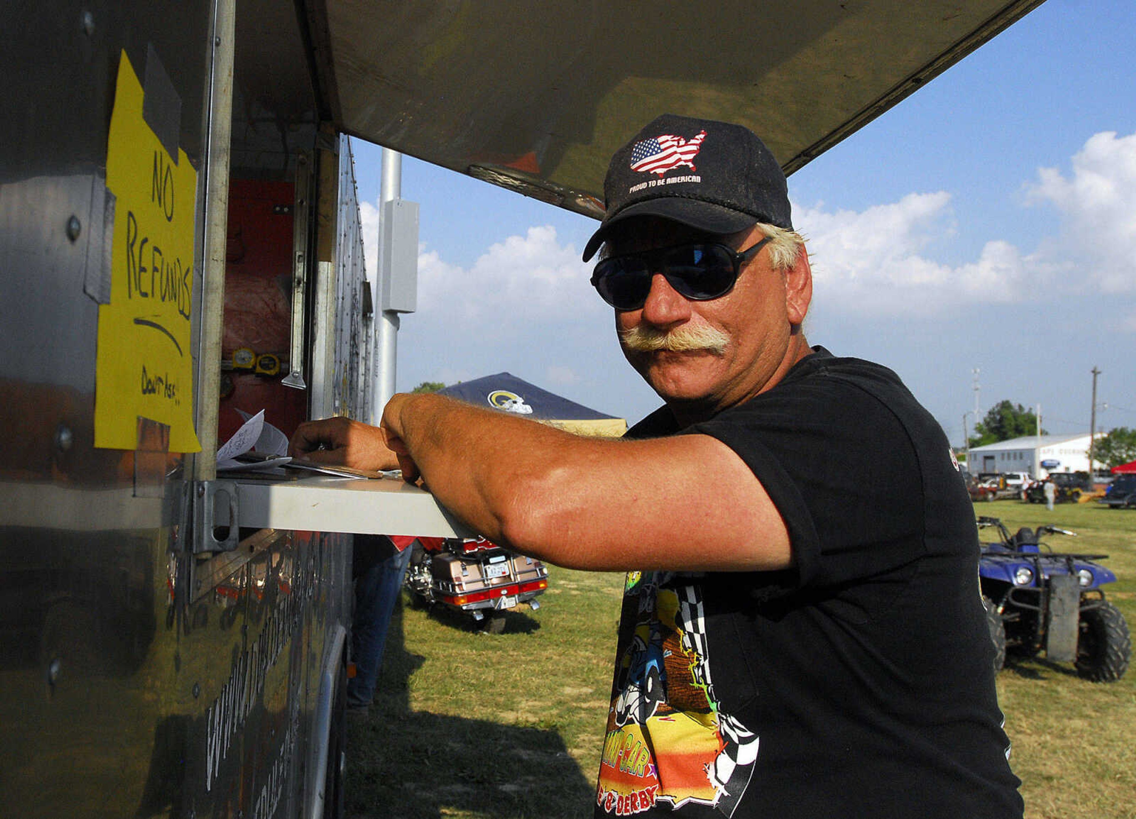 LAURA SIMON~lsimon@semissourian.com
Cowboy, vice-president of Auto Race Promotions, Inc. which presents the Dual Demolition Derby, waits for the derby to begin during the U.S.A. Veterans Fourth of July celebration at Arena Park in Cape Girardeau Sunday, July 4, 2010.