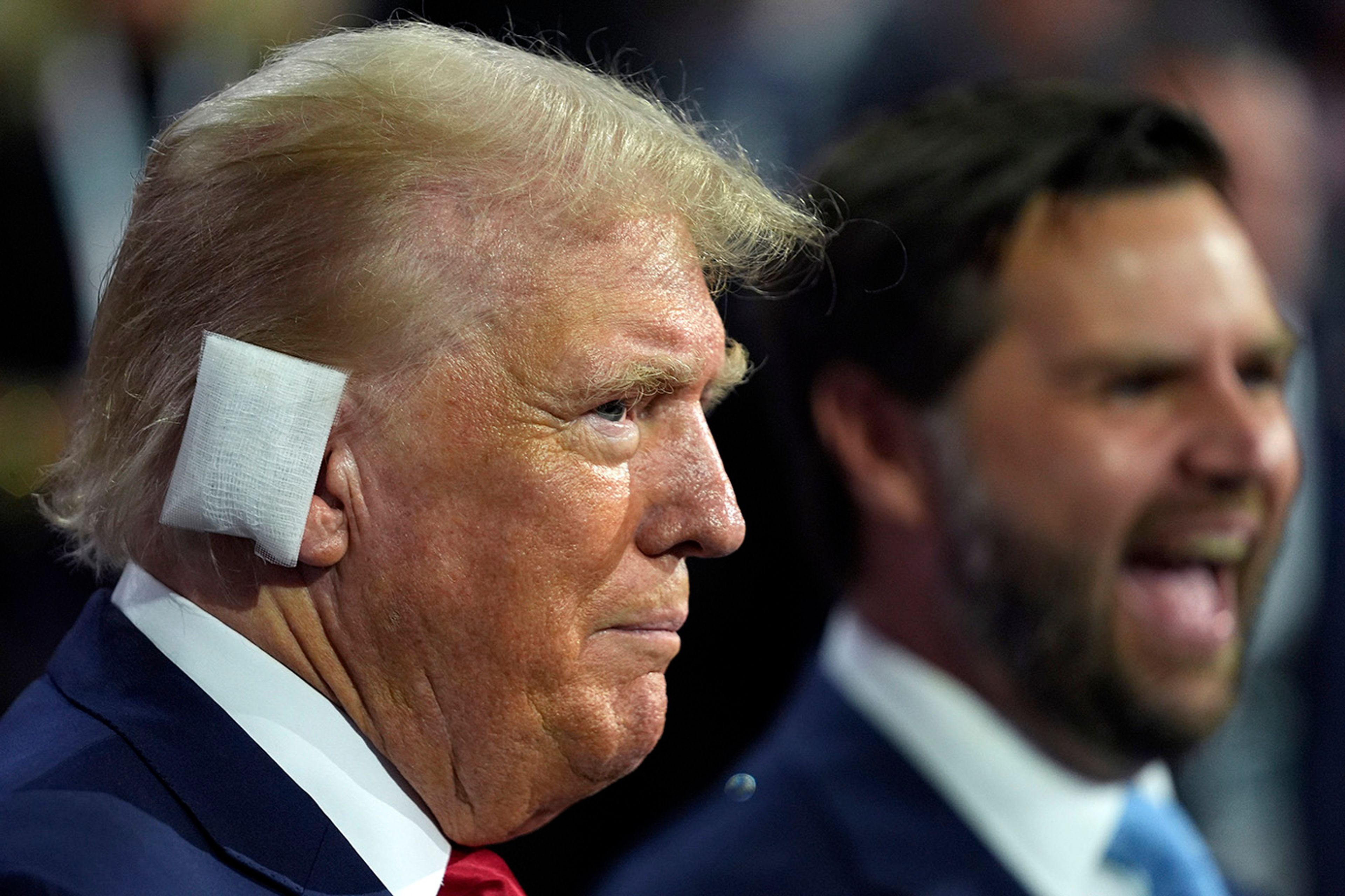 Republican presidential candidate former President Donald Trump and Republican vice presidential candidate Sen. JD Vance, R-Ohio, attend the first day of the Republican National Convention, Monday, July 15, 2024, in Milwaukee. 