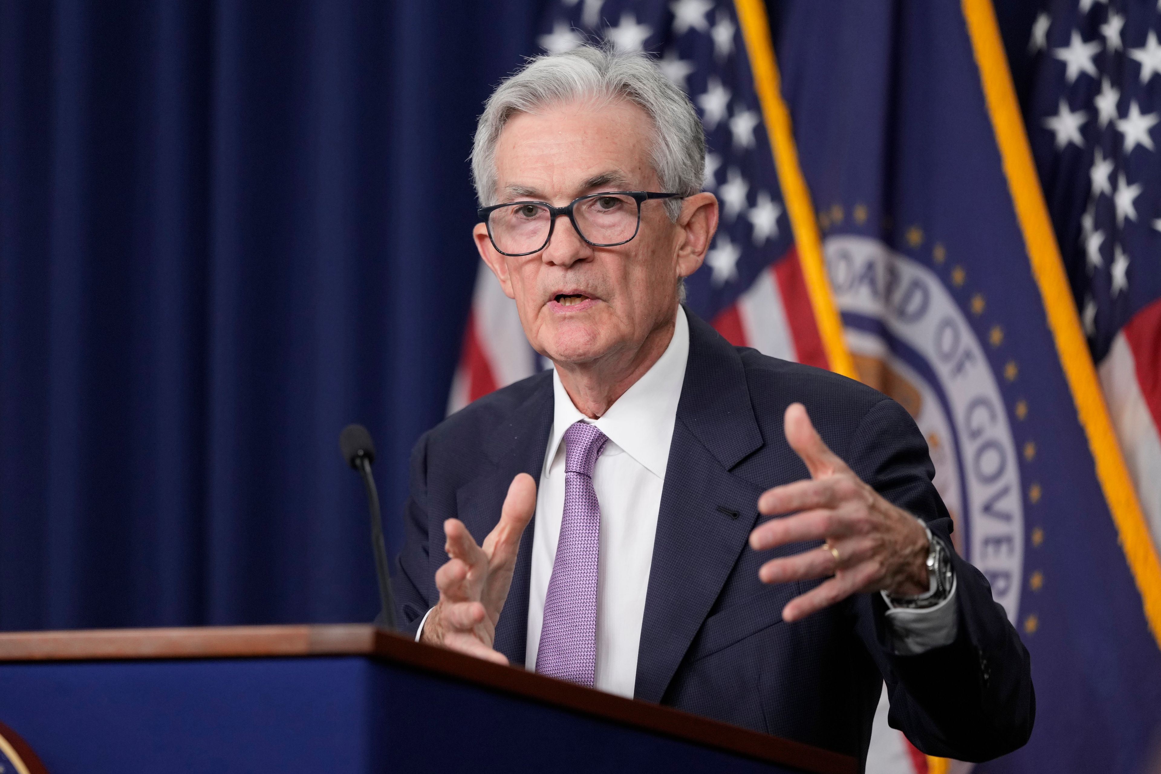 Federal Reserve cuts key rate by sizable half-point, signaling end to its inflation fight