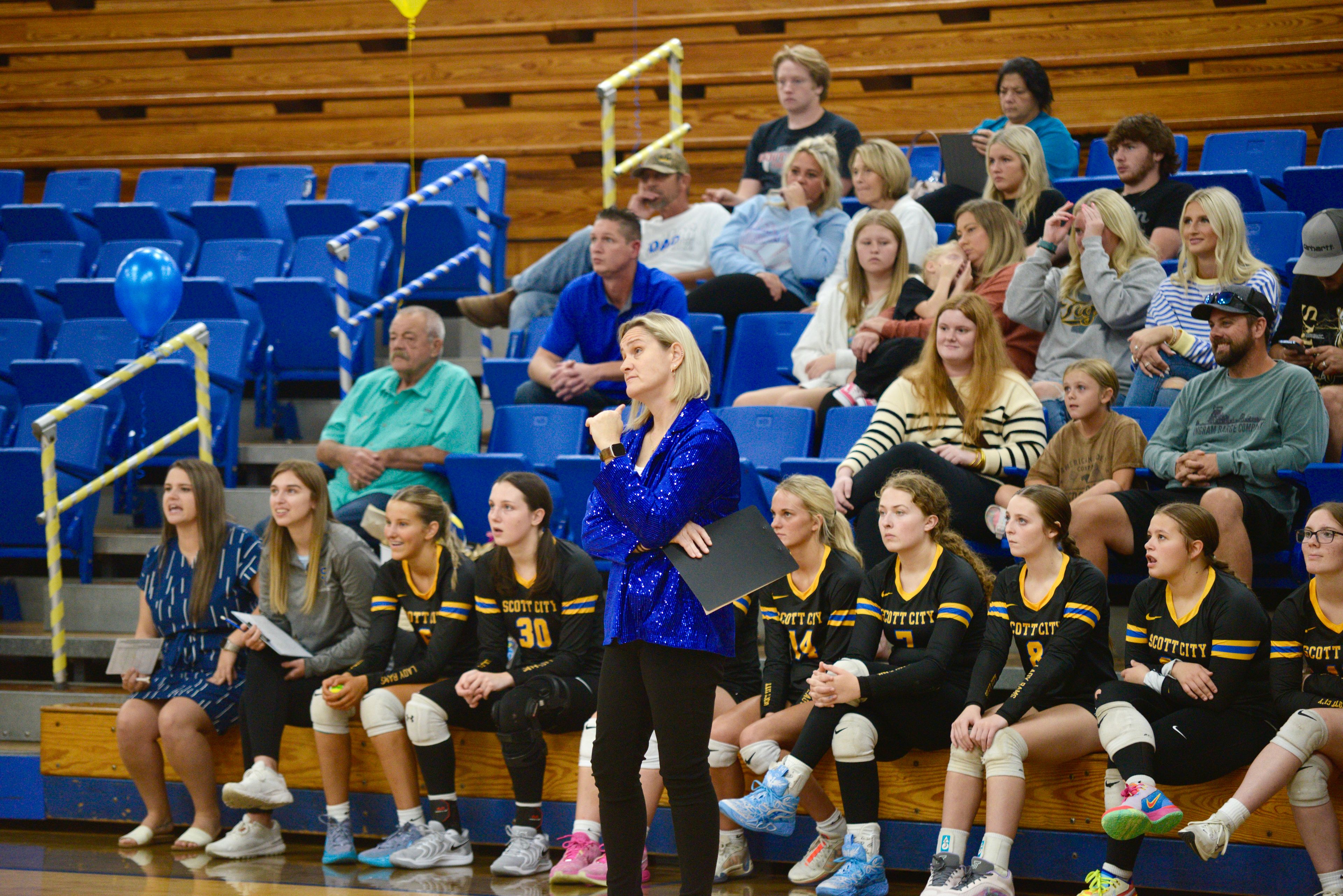 Scott City coach Cindy Henry looks on from the sidelines during a recent volleyball match in Scott City. 