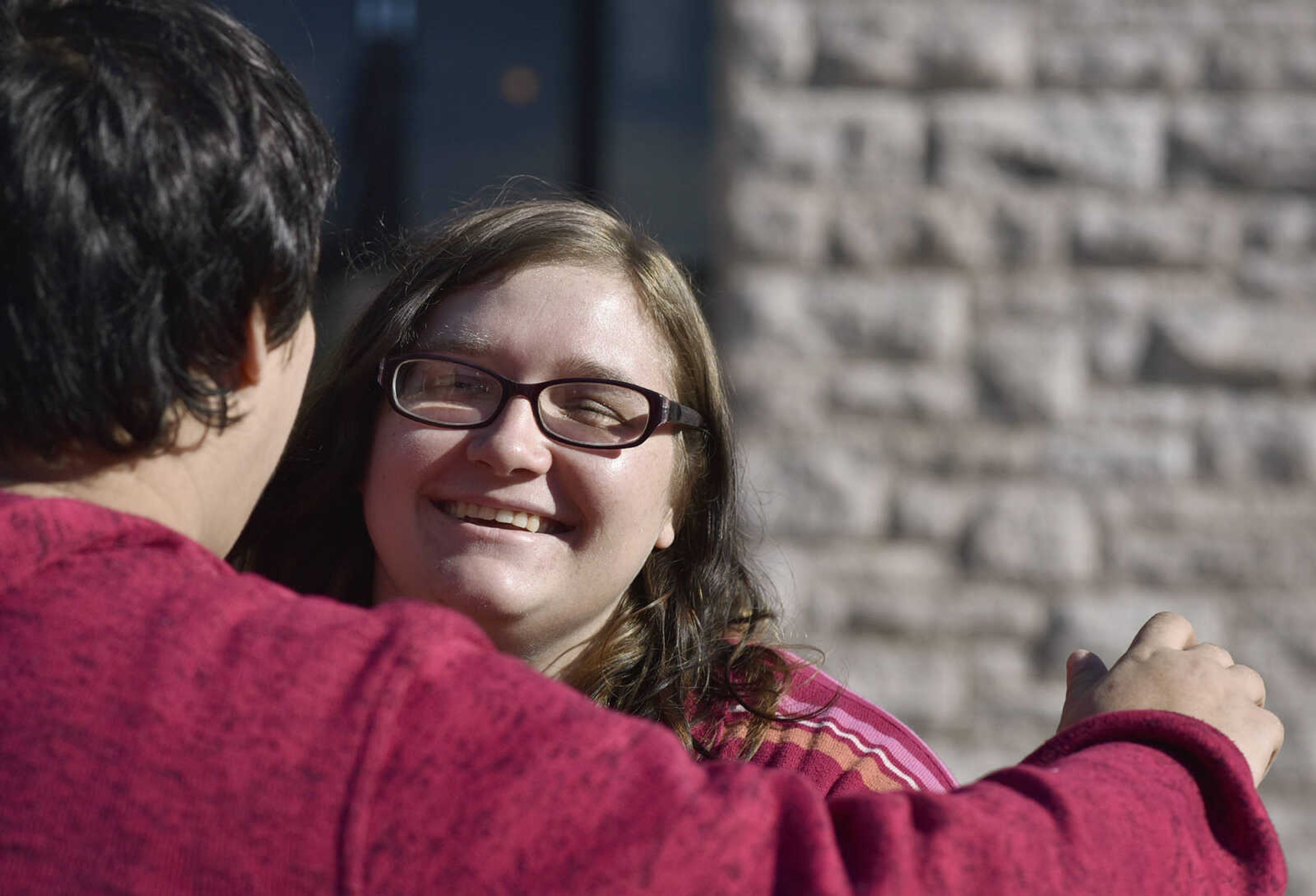 LAURA SIMON ~ lsimon@semissourian.com

Renee Boyd smiles as her girlfriend, Rachel Hornbeck, goes to hug her after Boyd's plea hearing on Monday, Nov. 21, 2016, at the Cape Girardeau County Courthouse. Boyd pleaded guilty to three counts of misdemeanor assault, stemming from an incident in January. As part of the plea, Boyd is receiving a suspended imposition of sentence.