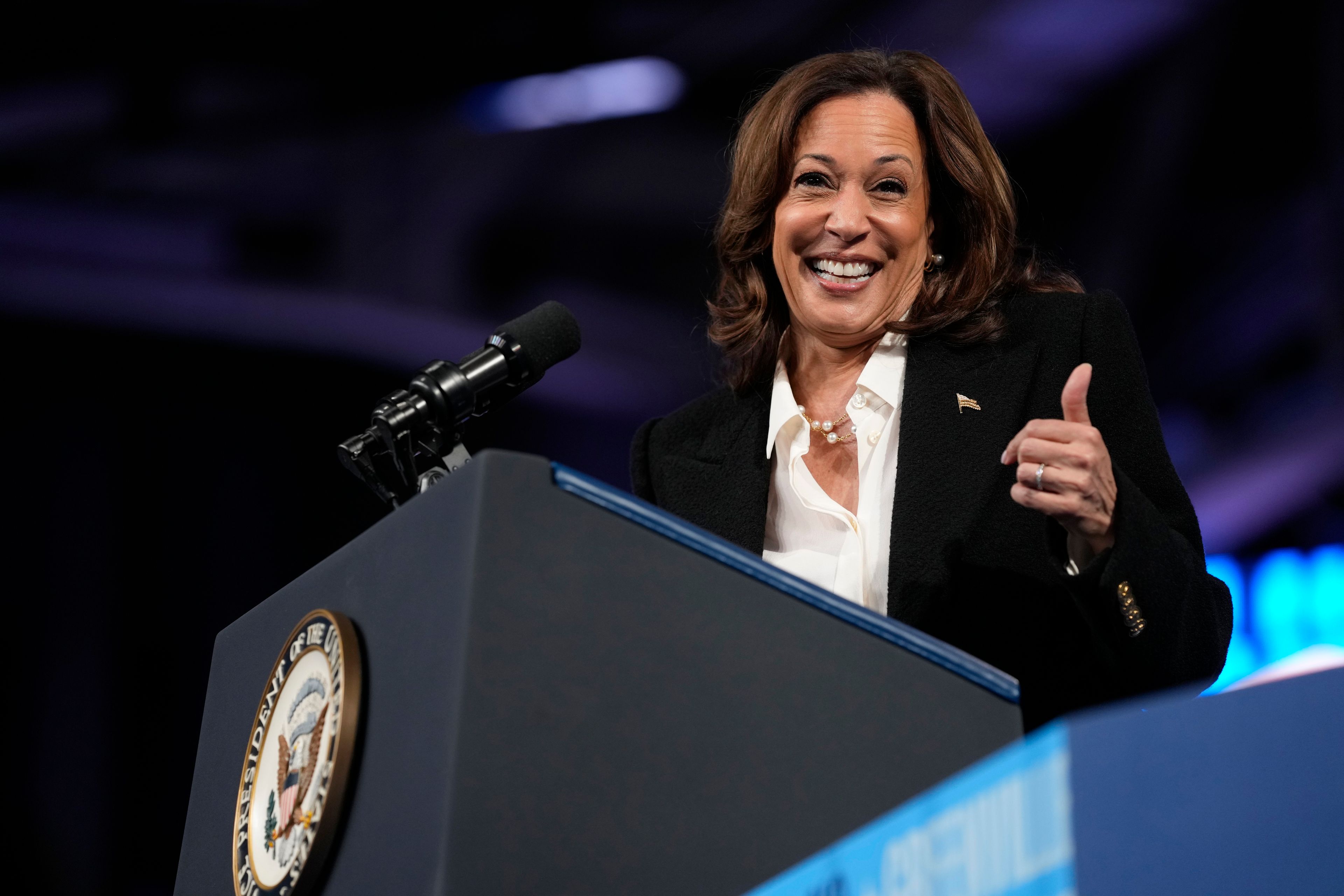 Democratic presidential nominee Vice President Kamala Harris gives a thumbs up as she speaks at a campaign rally at East Carolina University in Greenville, N.C., Sunday, Oct. 13, 2024. (AP Photo/Susan Walsh)