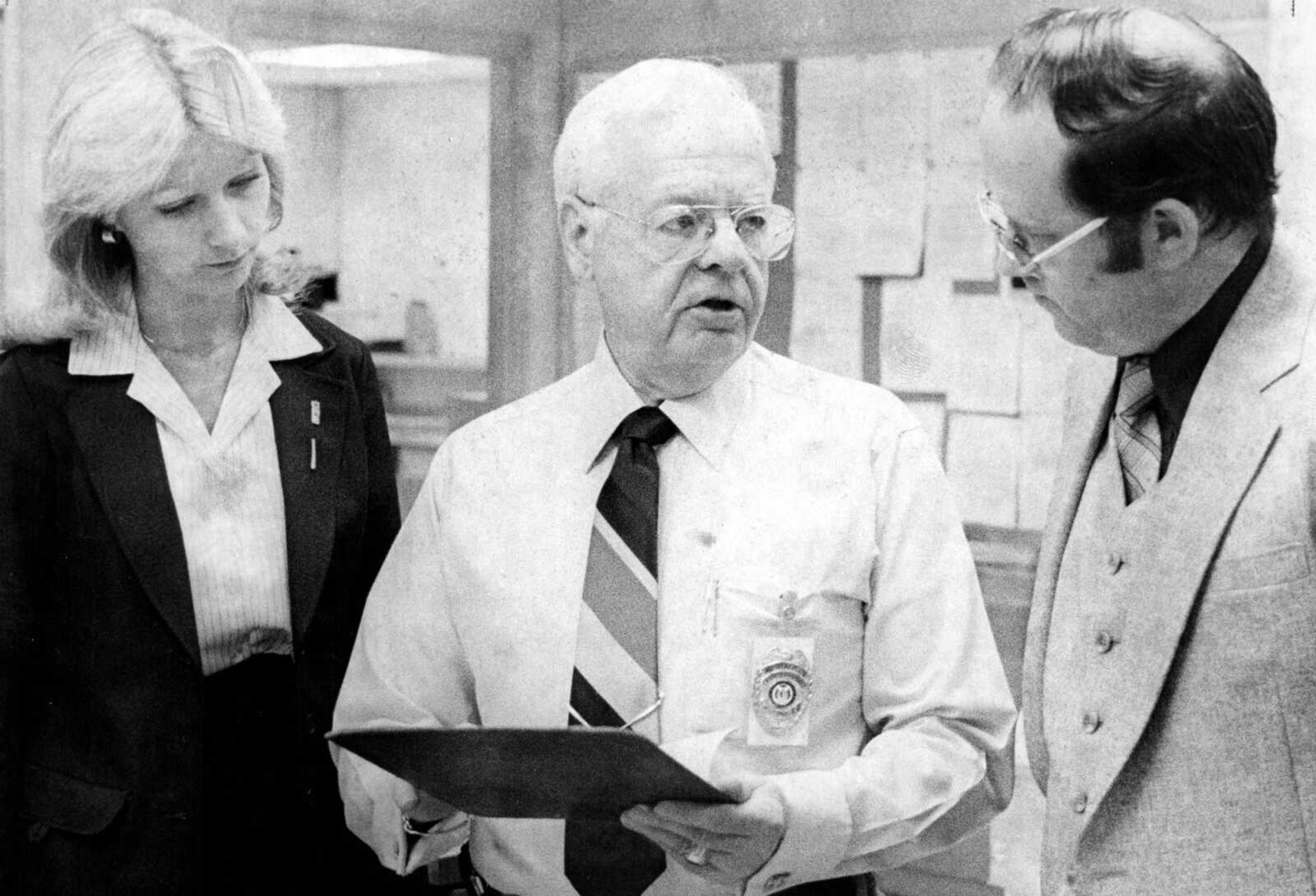 Cape Girardeau Police Chief Henry H. Gerecke, center, is seen with Cynthia M. Berger, left, and Charles D. Hale in this photo from Dec. 1, 1980.