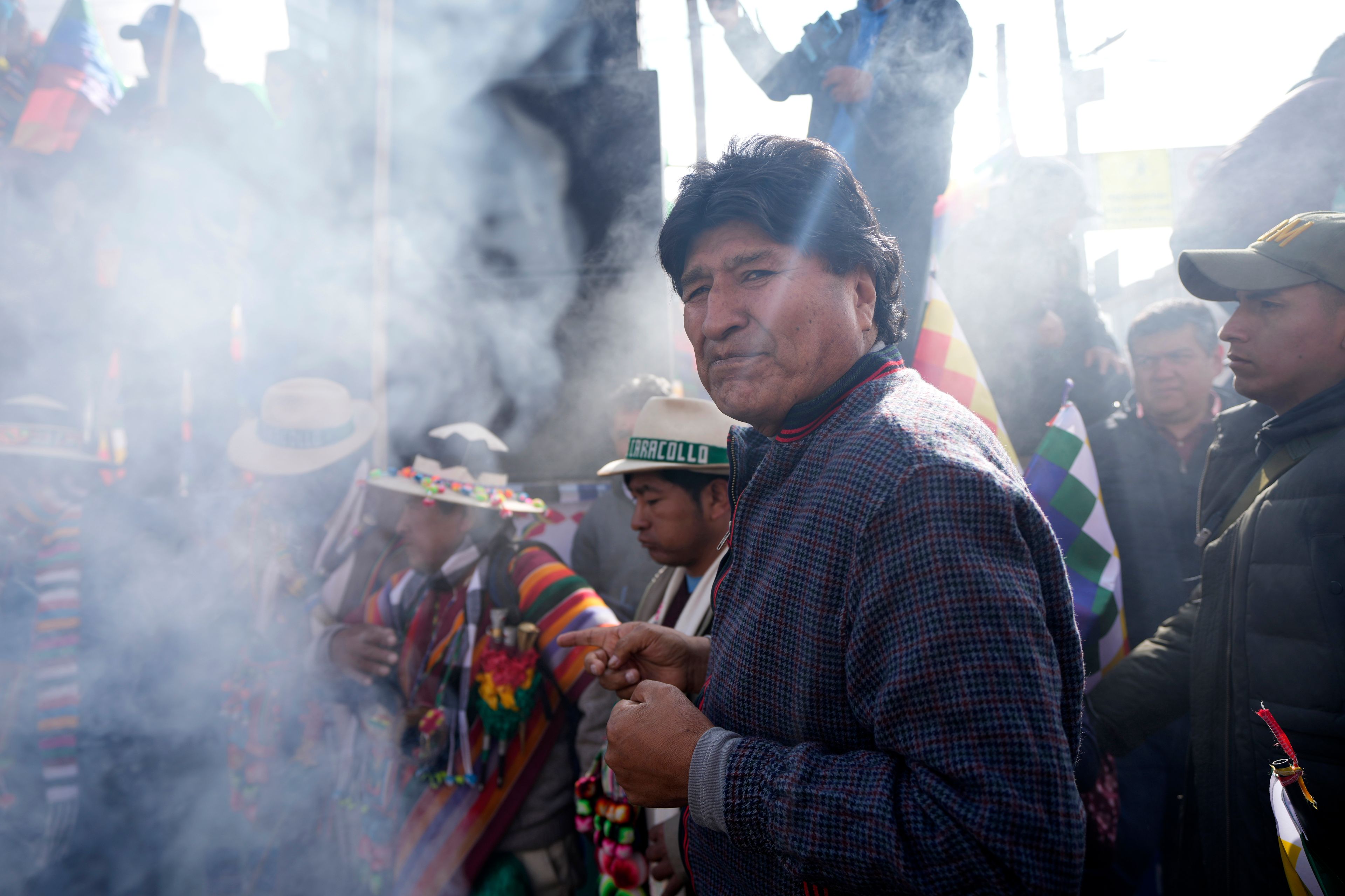 FILE - Former President Evo Morales participates in an offering to Mother Earth before leading a march to Bolivia's capital, as part of a political dispute with current President Luis Arce and to protest his handling of the economy, in Caracollo, Bolivia, Sept. 17, 2024. (AP Photo/Juan Karita, File)