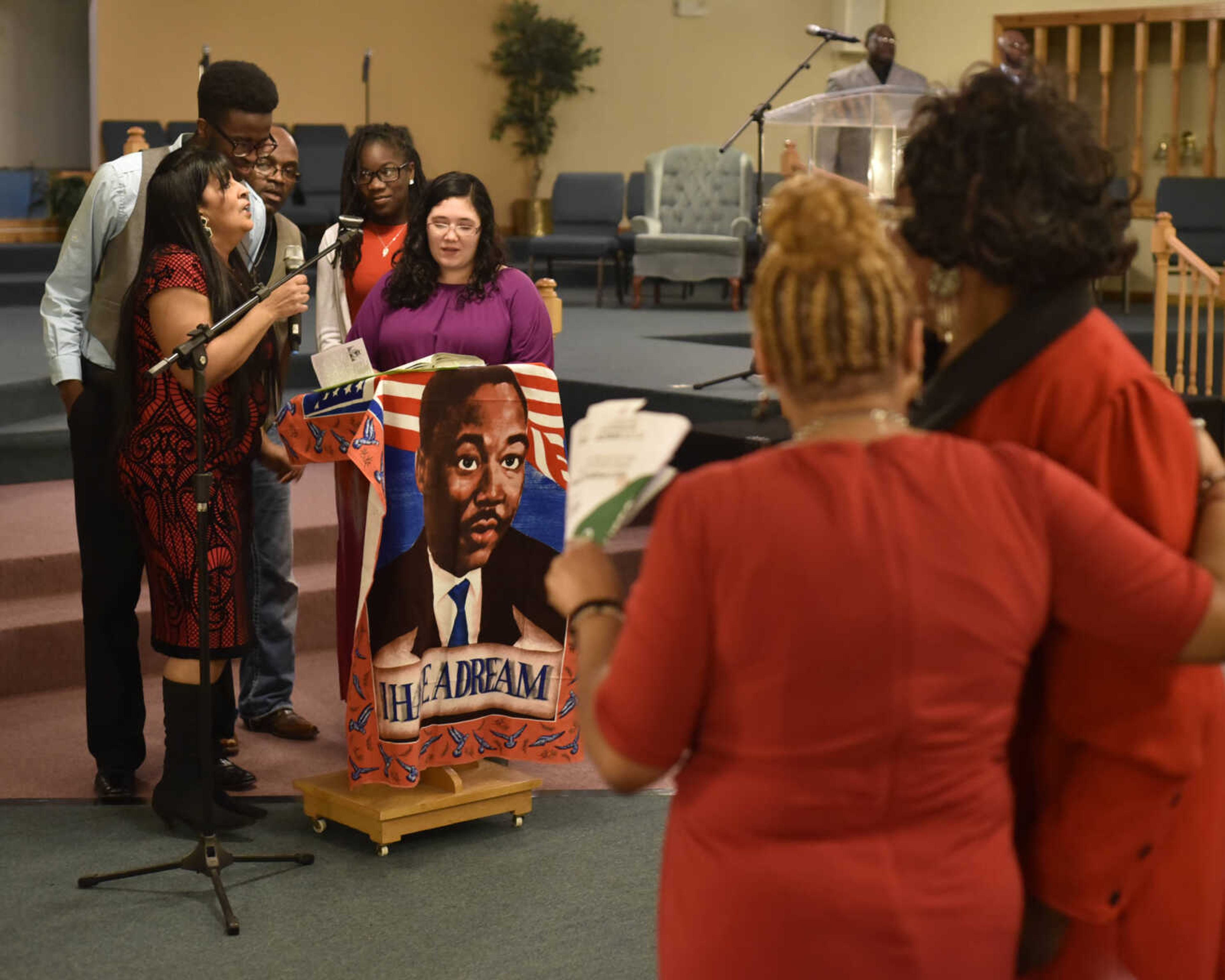 BEN MATTHEWS ~ bmatthews@semissourian.com&nbsp;Debra Mitchell-Braxton leads other cantors in song at the Dr. Martin Luther King, Jr. Community Celebration Program at Greater Dimension Ministries in Cape Girardeau on January 15, 2017.