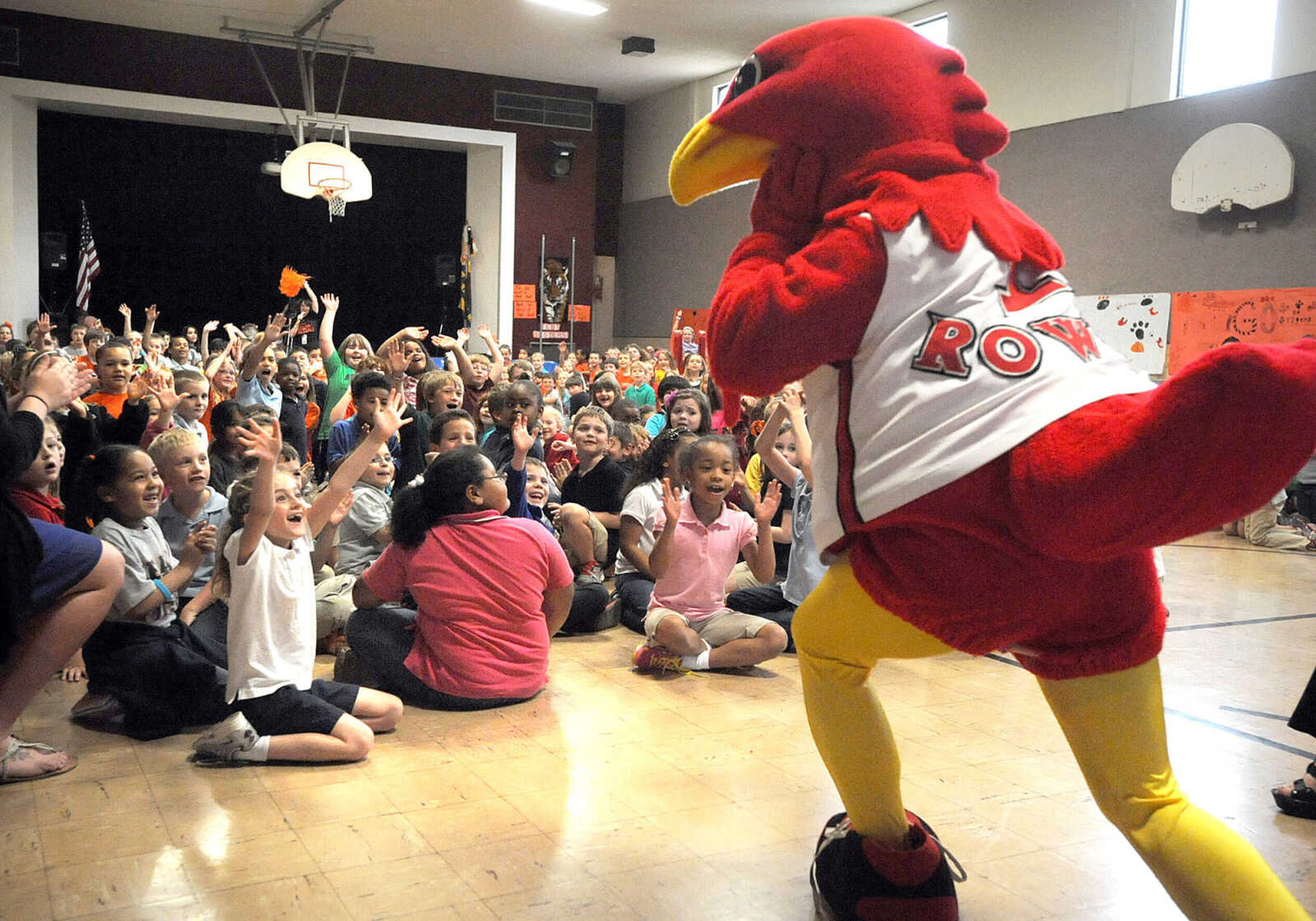 LAURA SIMON ~ lsimon@semissourian.com

Rowdy the Redhawk enters the Alma Schrader Elementary gym Monday, April 15, 2013 for the school's motivational pep rally in preparation for MAP testing.