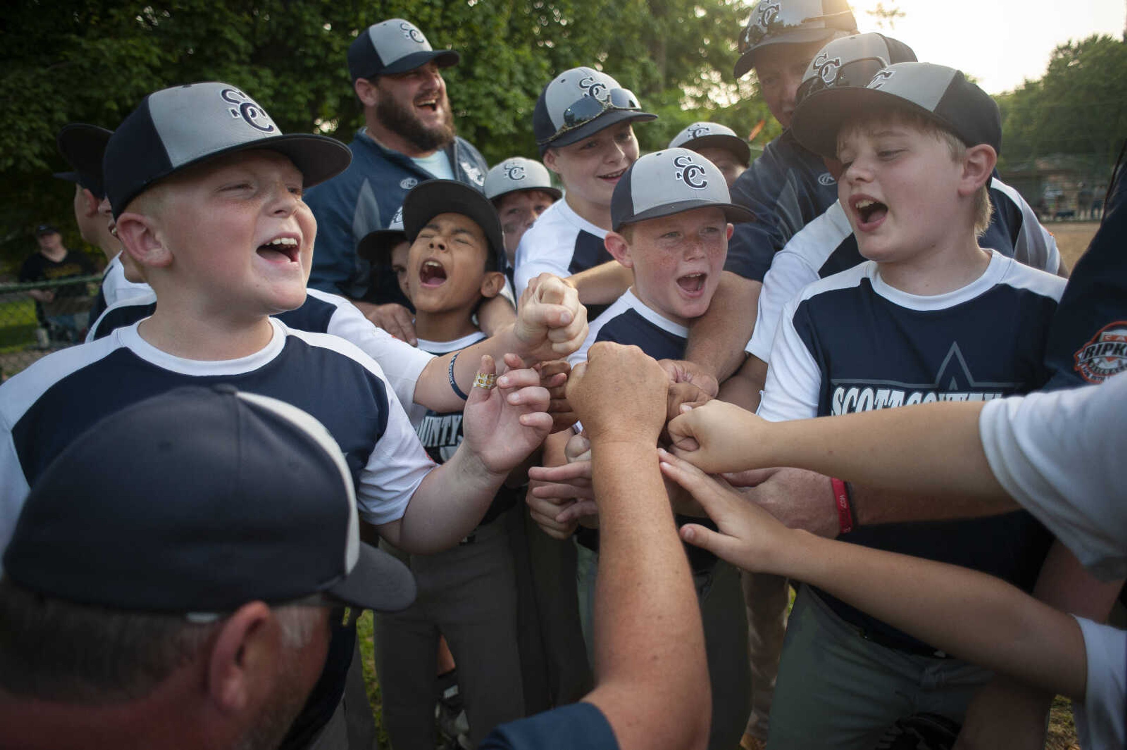 The Scott County All-Stars put their hands together before the start of the championship game of the 2019 Kelso 11U Showdown on Sunday, June 2, 2019, in Kelso. The team defeated the SEMO Cardinals 5-2.