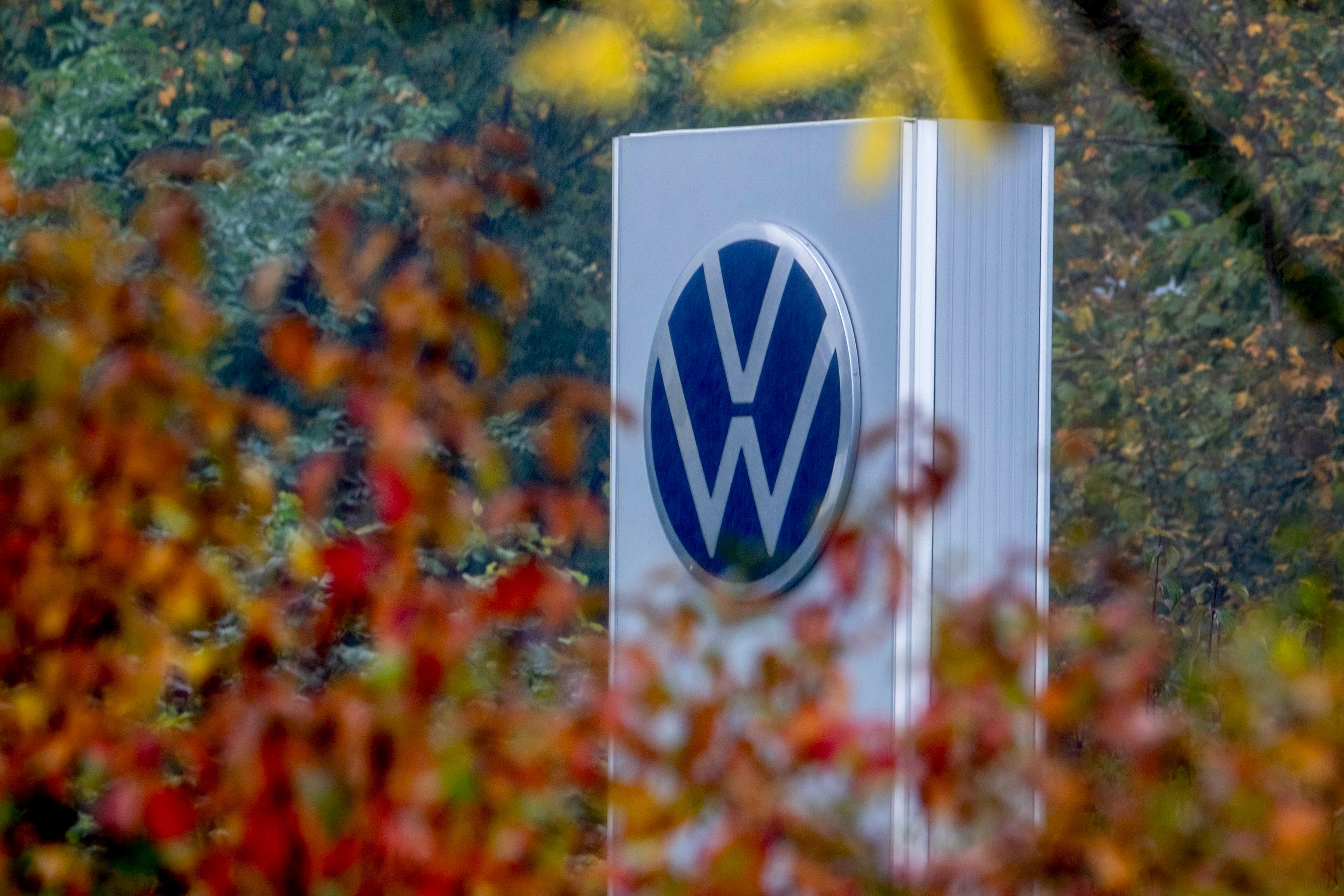 A Volkswagen logo of a car dealer is pictured in Neu-Anspach near Frankfurt, Germany, Wednesday, Oct. 30, 2024. (AP Photo/Michael Probst)