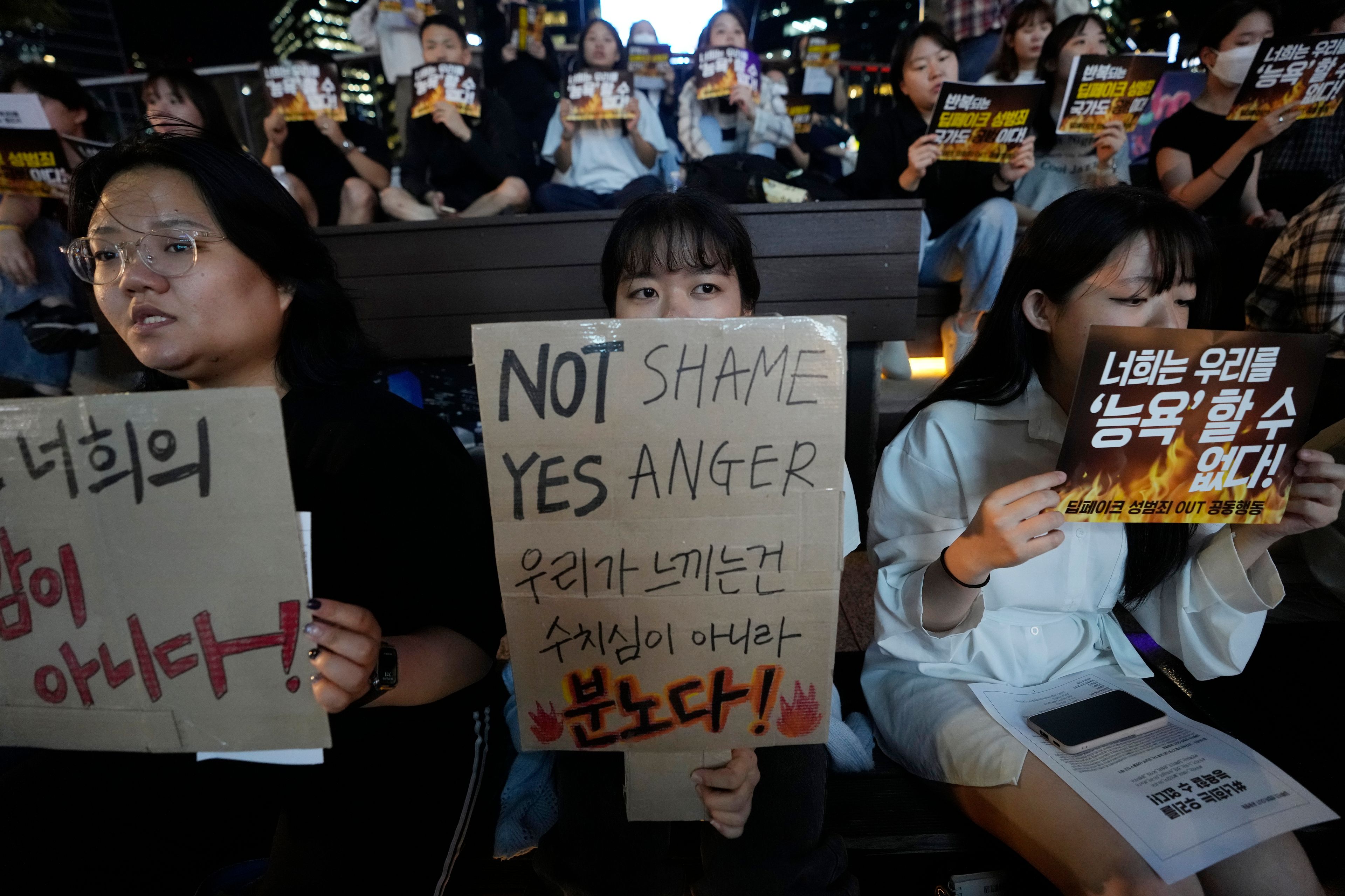 Citizens stage a rally against deepfake sex crime in Seoul, South Korea, Friday, Sept. 27, 2024. (AP Photo/Ahn Young-joon)