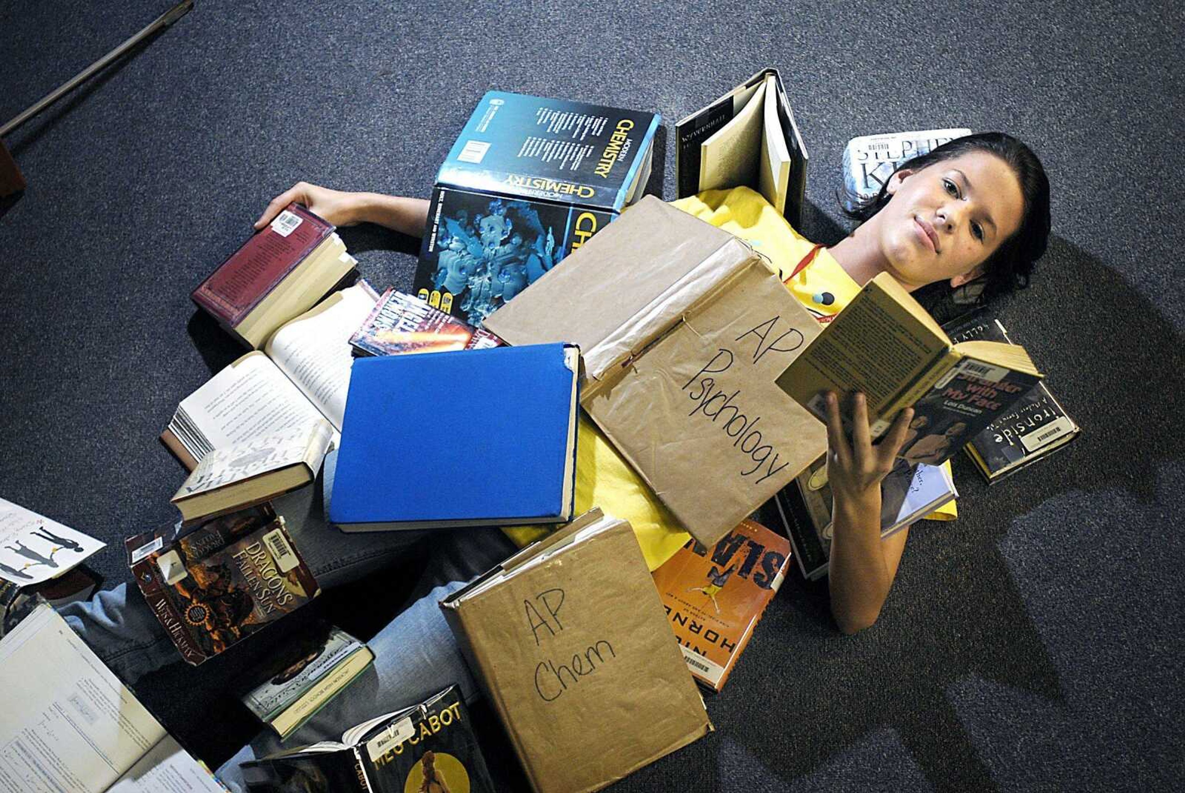 Jackson High School junior Alexis Bogenpohl took a break from studying Thursday in the school library. (Kit Doyle)