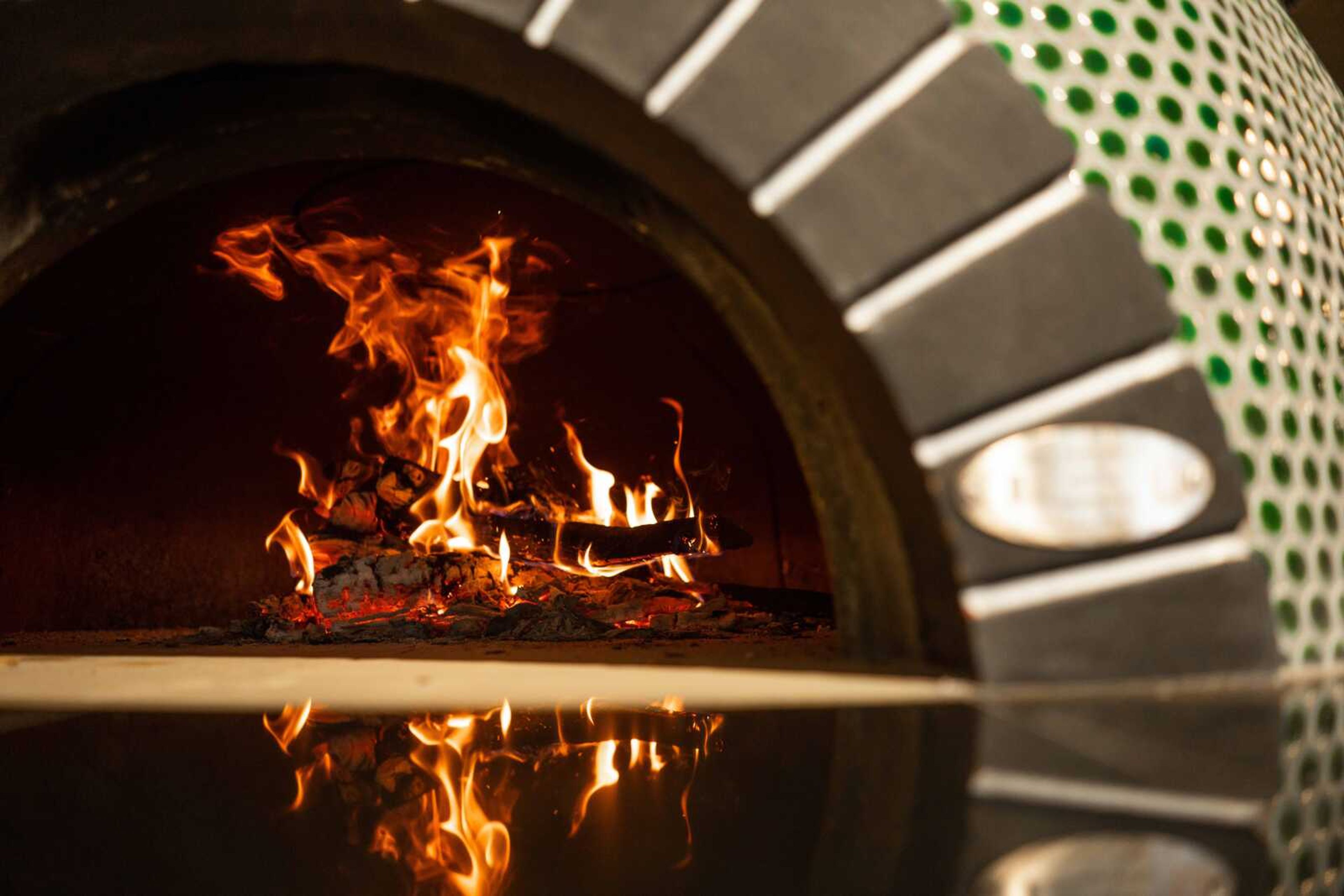 Speck's wood-fired oven, with parts shipped from Italy and assembled in California, will be a centerpiece of the eatery's operation.