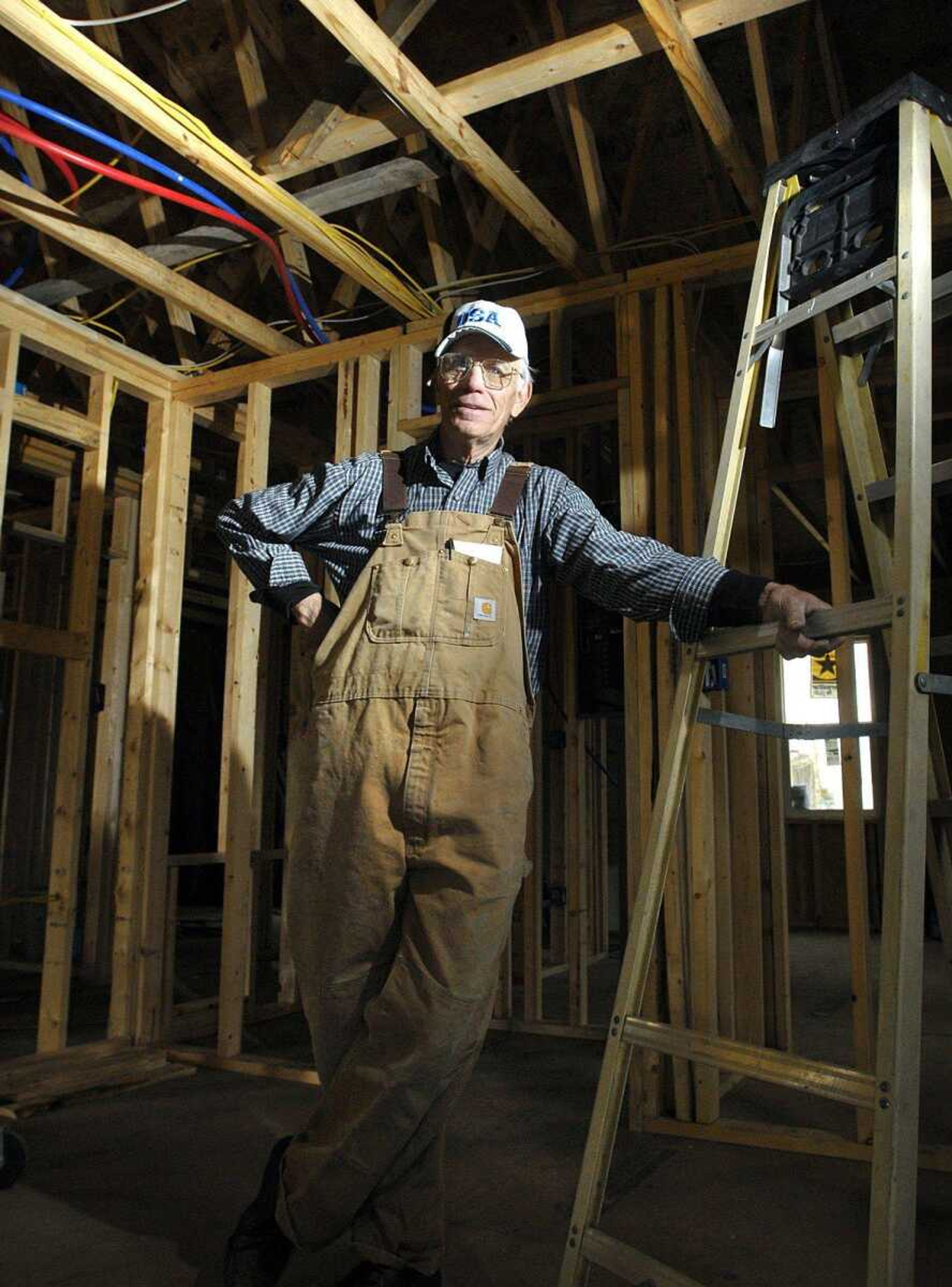 Ervin Belcher inside a new home he is building in Morley, Mo. Friday, February 24, 2012. (Laura Simon)