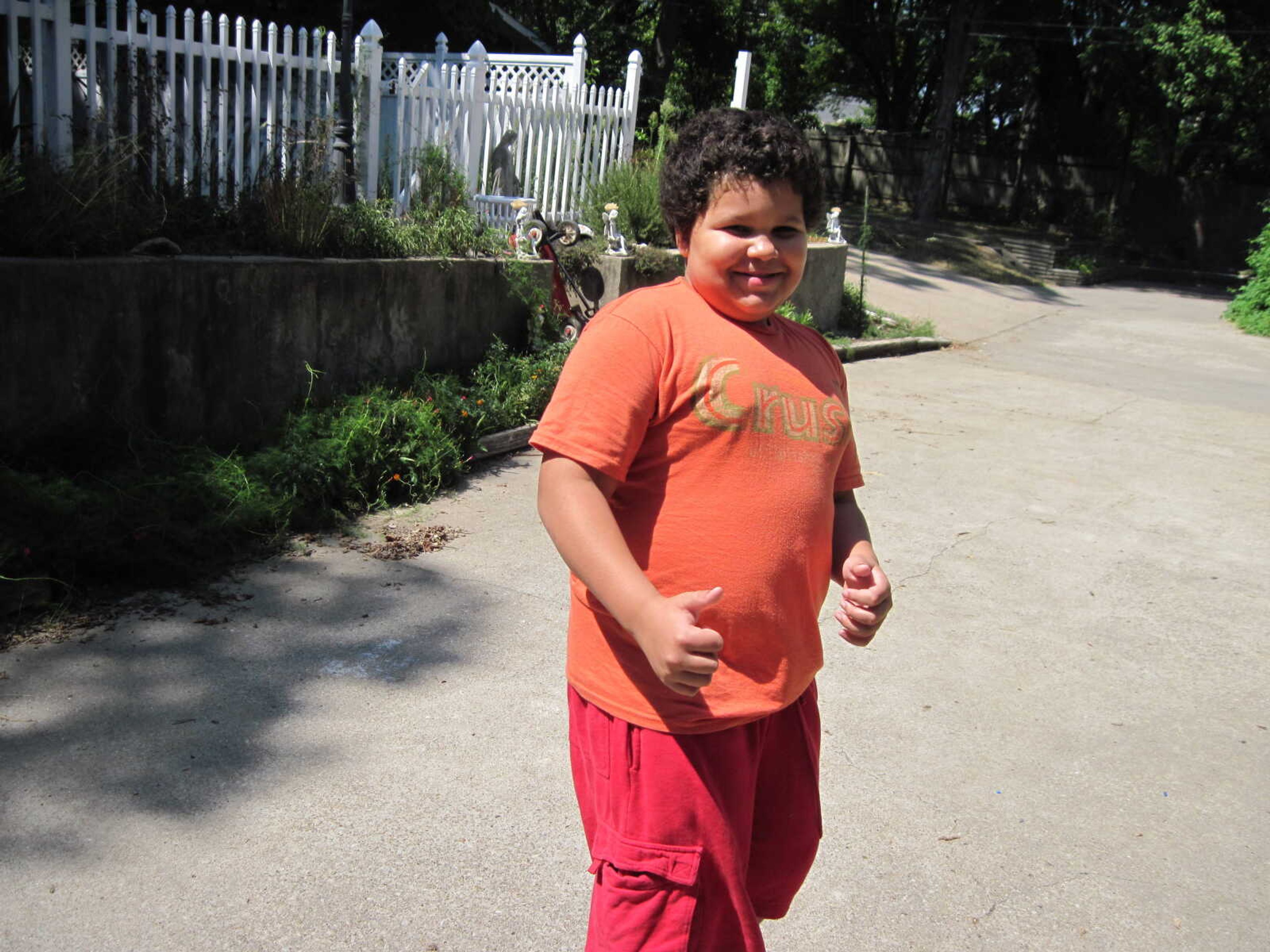 Johnny shows off some of his skateboarding skills.