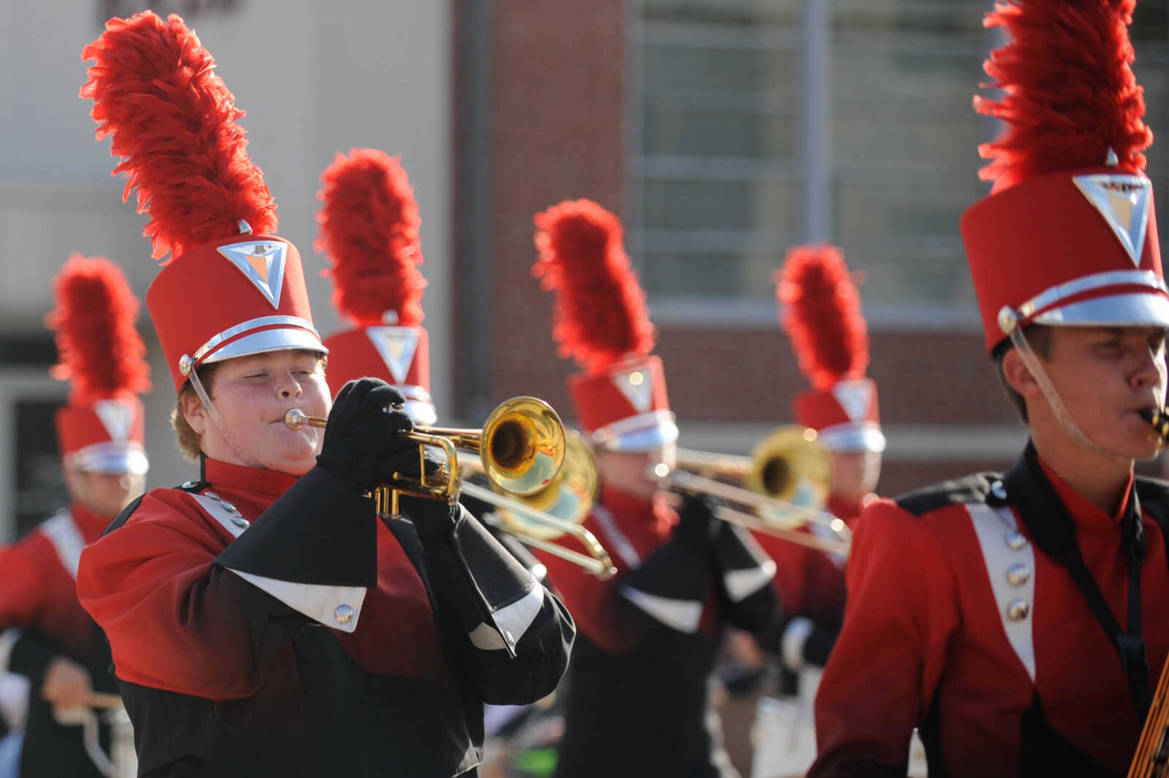 GLENN LANDBERG ~ glandberg@semissourian.com

Members of the Woodland High School marching band play a song while moving through Uptown Jackson during the Jackson Band Festival parade Tuesday, Oct. 6, 2015.