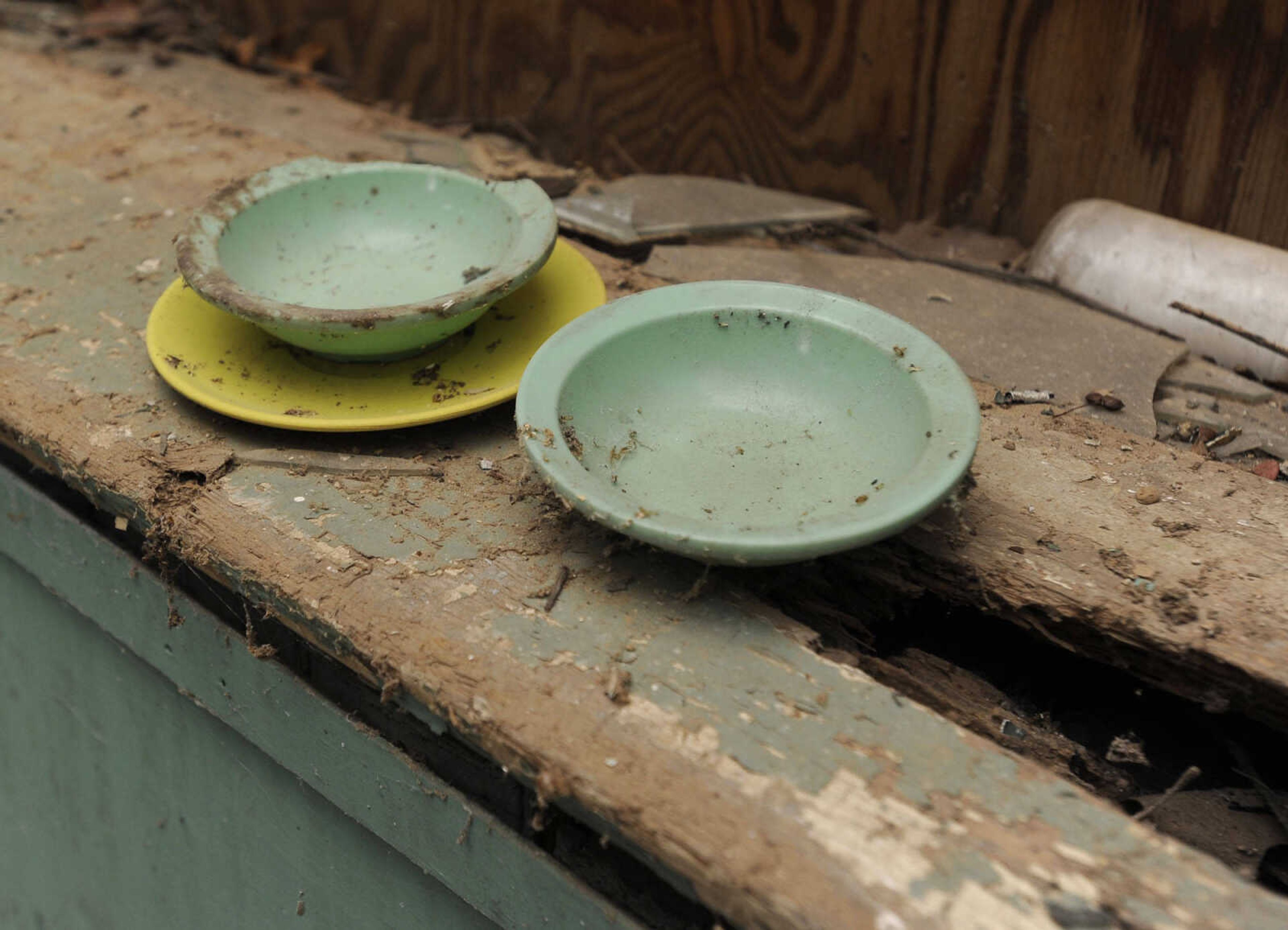 Dishes sit on a window sill at the old Kage School on Monday, March 24, 2014 in Cape Girardeau.