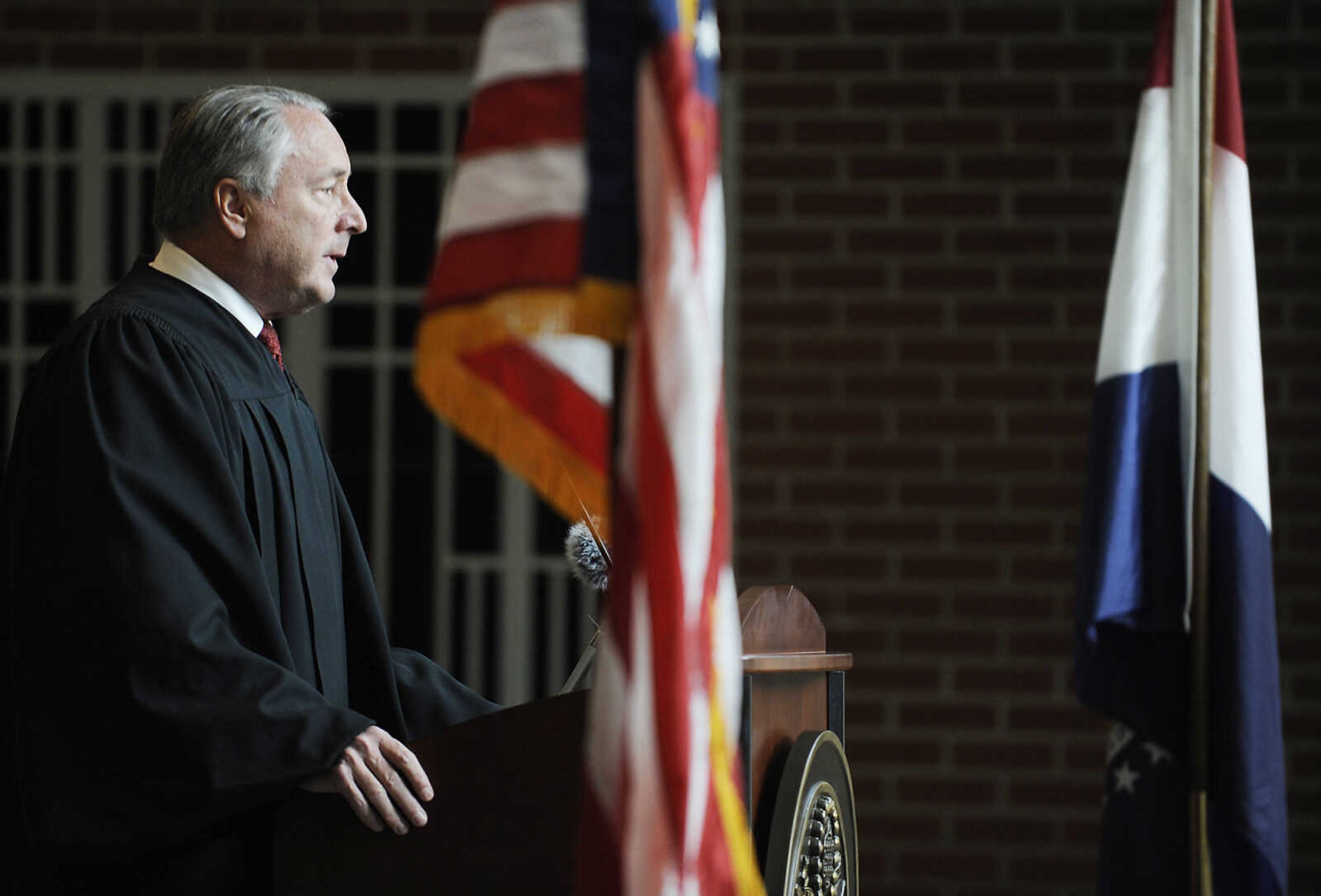 U.S. District Court Judge Stephen N. Limbaugh Jr. speaks during a naturalization ceremony Wednesday, May 1, at the Rush H. Limbaugh Sr. U.S. Courthouse in Cape Girardeau. Limbaugh administered the Oath of Allegiance to 29 people from 11 countries, making them U.S. citizens, during the ceremony.