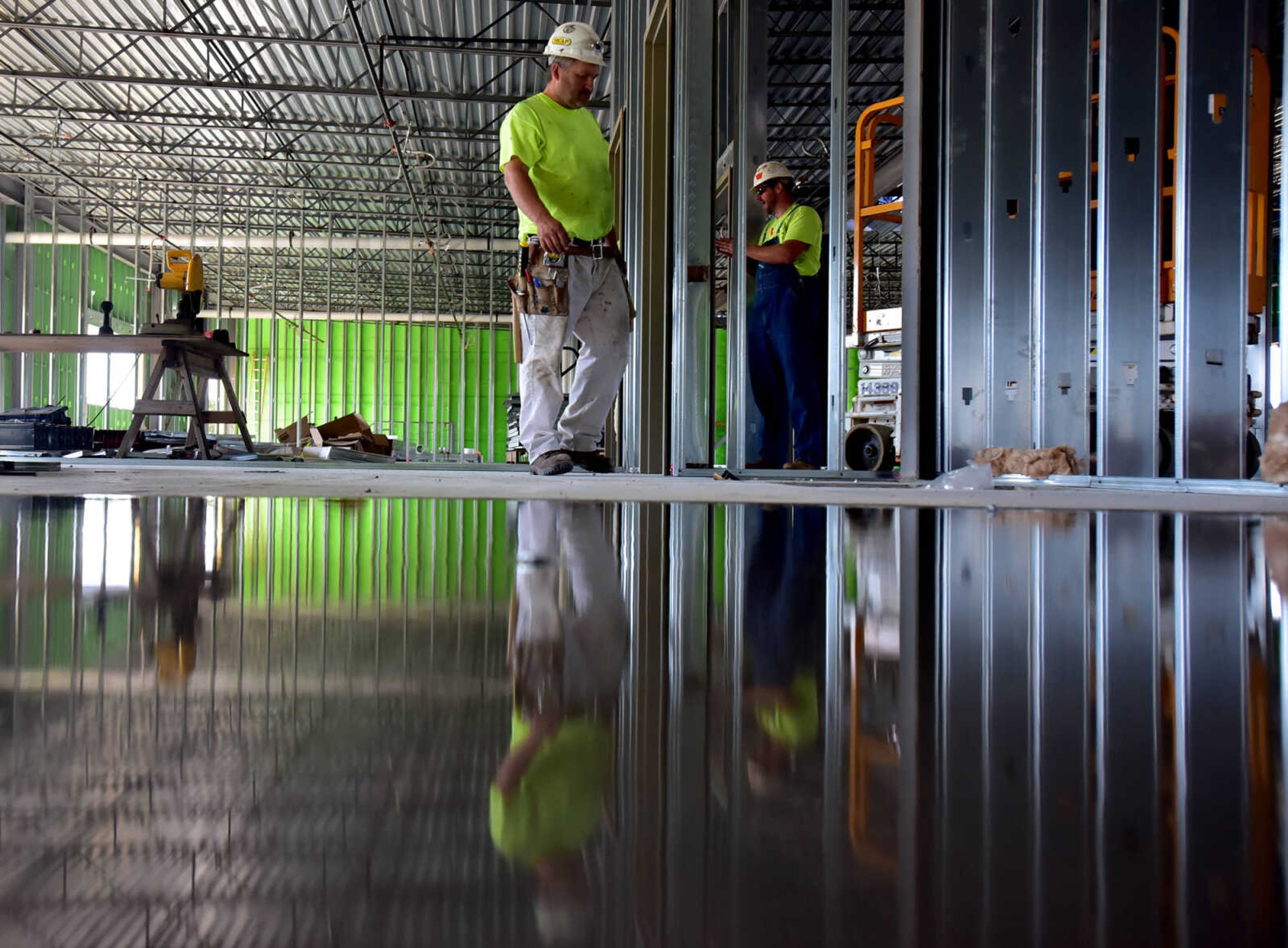 ANDREW J. WHITAKER ~ awhitaker@semissourian.com
Pat Steinmetz walks along the second floor while working on the Career Technology Center extension building Monday, Oct. 17, 2016 in Cape Girardeau.