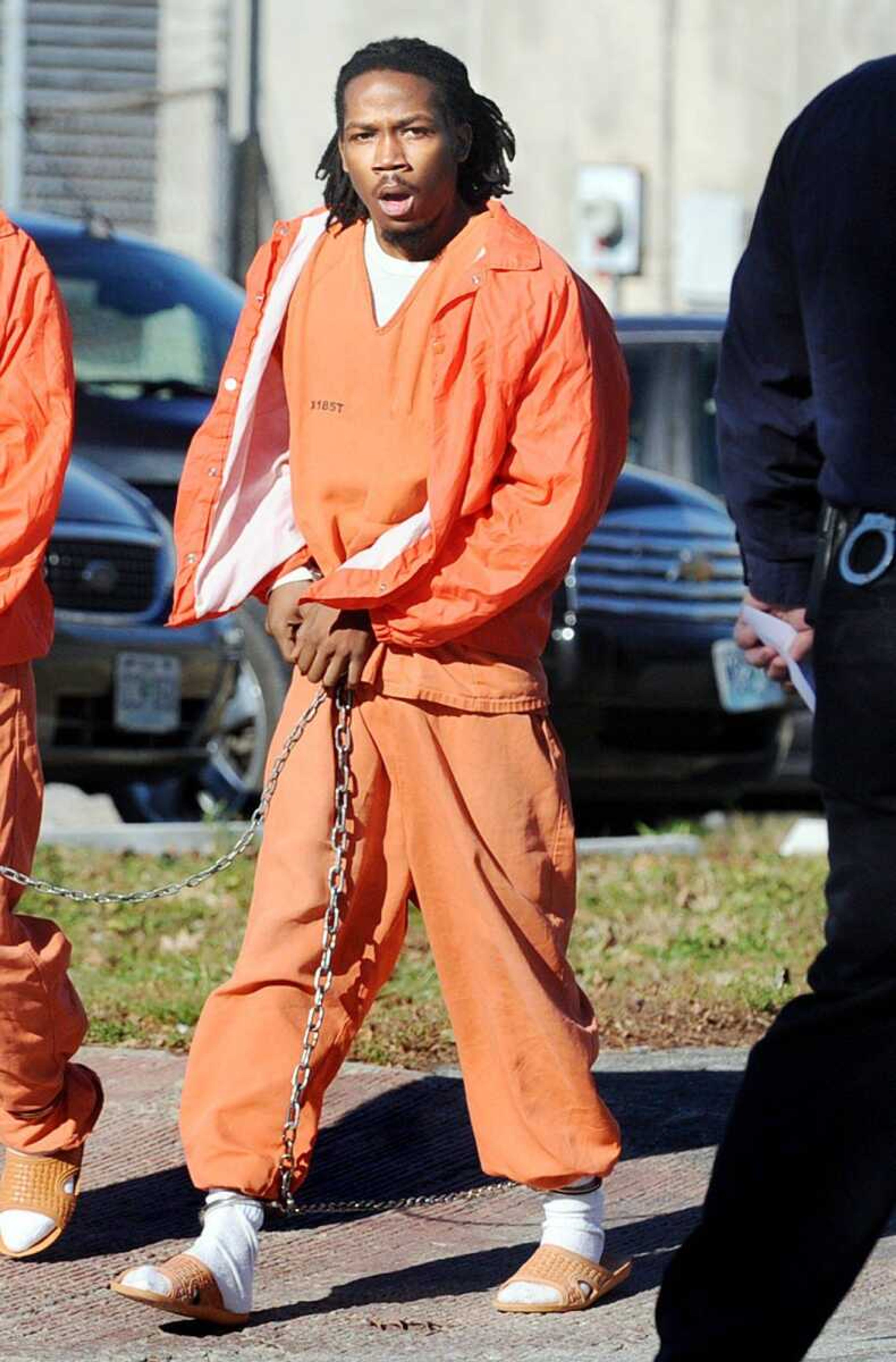 Vincent T. Anderson is escorted to the Jackson Courthouse for his preliminary hearing Tuesday afternoon, Dec. 11, 2012. Anderson, of Little Rock, Ark., is facing charges of first-degree assault, motor vehicle tampering, leaving the scene of an accident and one count of resisting arrest. The charges stem from an Oct. 28 incident where Anderson and Marcus Jones drove a stolen vehicle into a group of joggers in downtown Cape Girardeau. (Laura Simon)