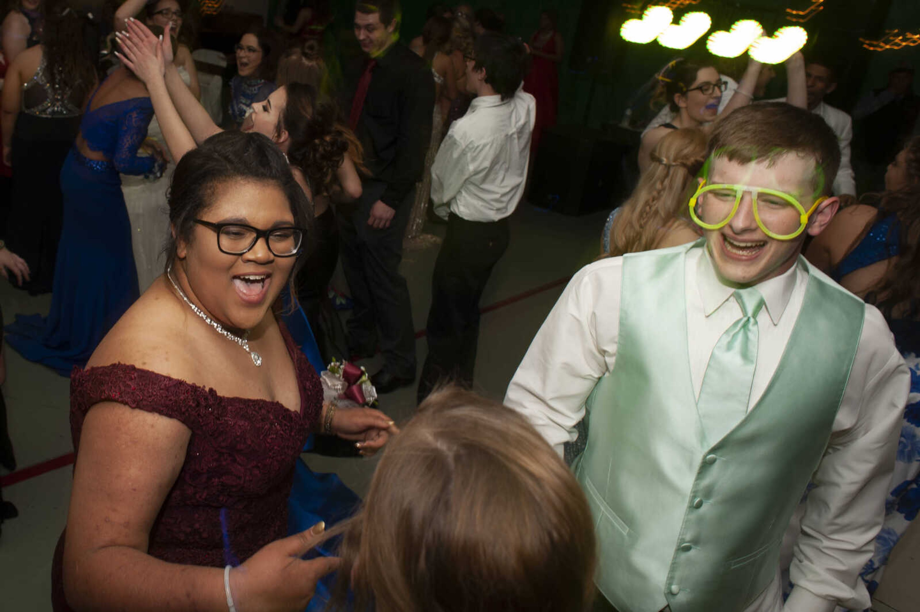 Delta sophomore Danielle Thomas dances next to Delta junior Jon Bond during Delta High School's prom on Saturday, April 13, 2019, at the Delta Community Center.