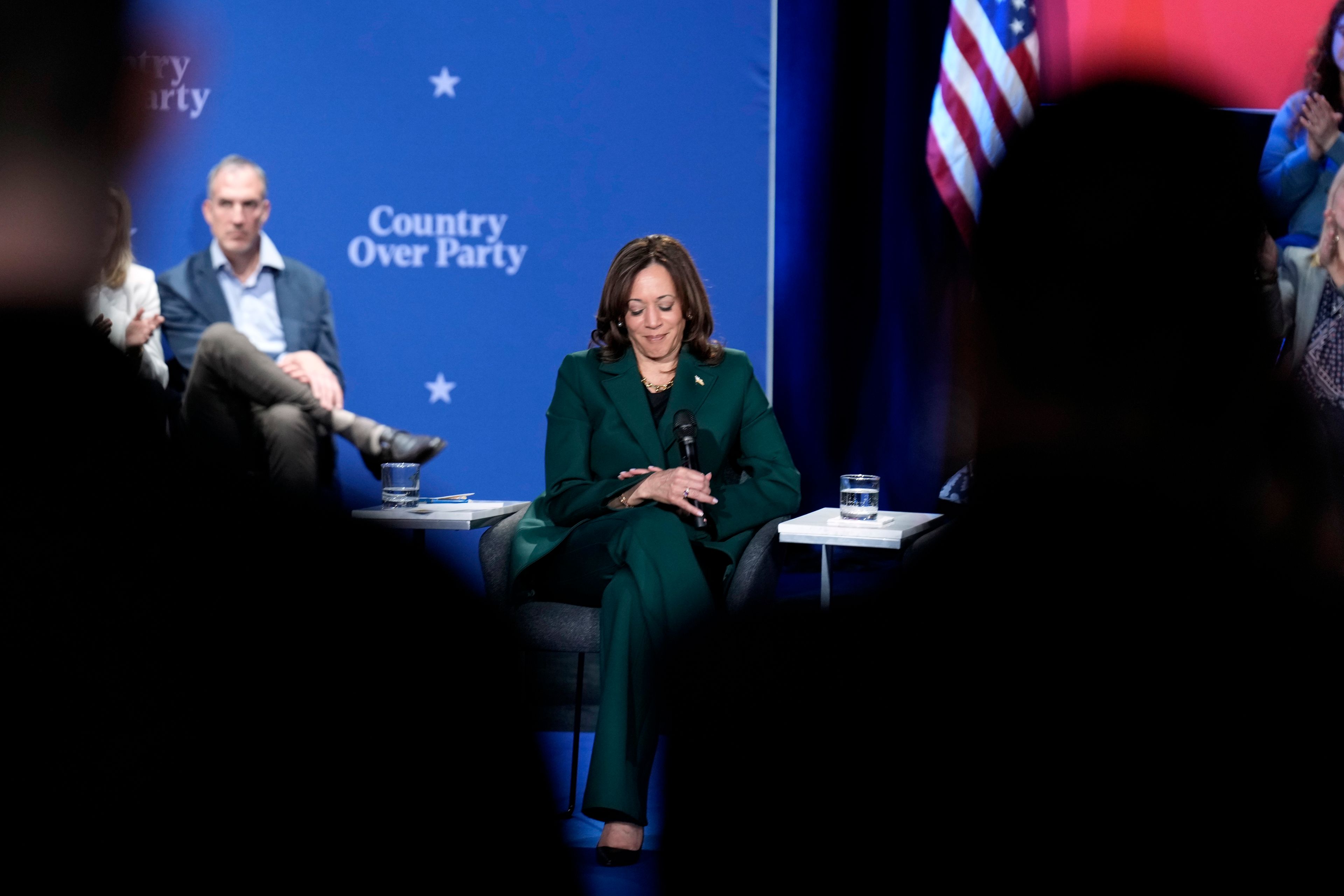 Democratic presidential nominee Vice President Kamala Harris listens during a town hall at the Royal Oak Theatre in Royal Oak, Mich., Monday, Oct. 21, 2024. (AP Photo/Jacquelyn Martin)