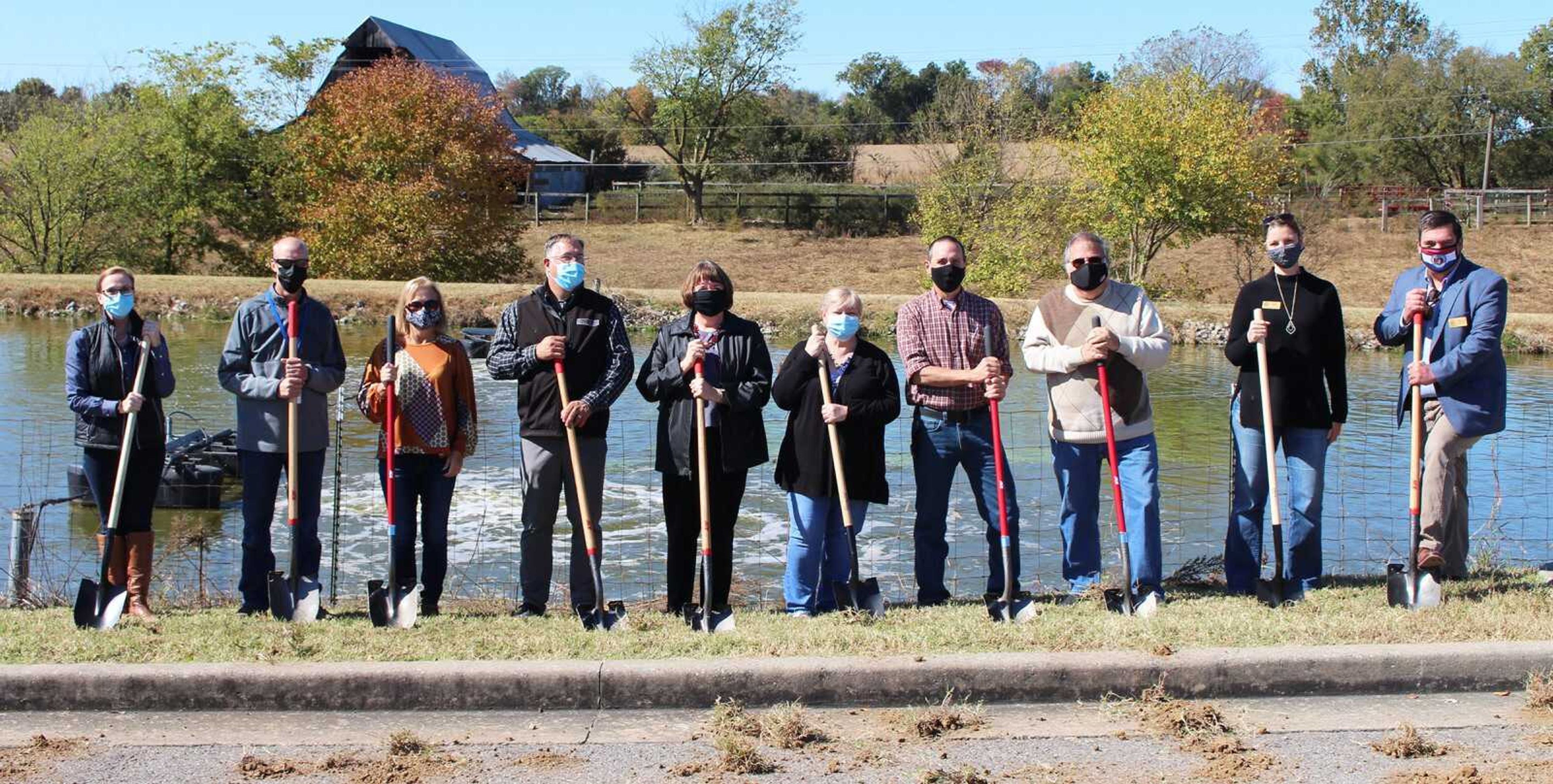 From left to right, Rep. Holly Rehder, Cape Girardeau County Commissioner Charlie Herbst, Debbie Colyott of Rep. Jason Smith's office, Brian Strickland, Cape Girardeau County Reorganized Common Sewer Board members Betty Brooks, Renee Boyer, Joe Tousignant, Greg Steiner; Lesley Rone of Senator Roy Blunt's office and Matt Bain of Senator Josh Hawley's office break ground on a new sewage treatment plant Friday, Oct. 16, 2020, in Fruitland.