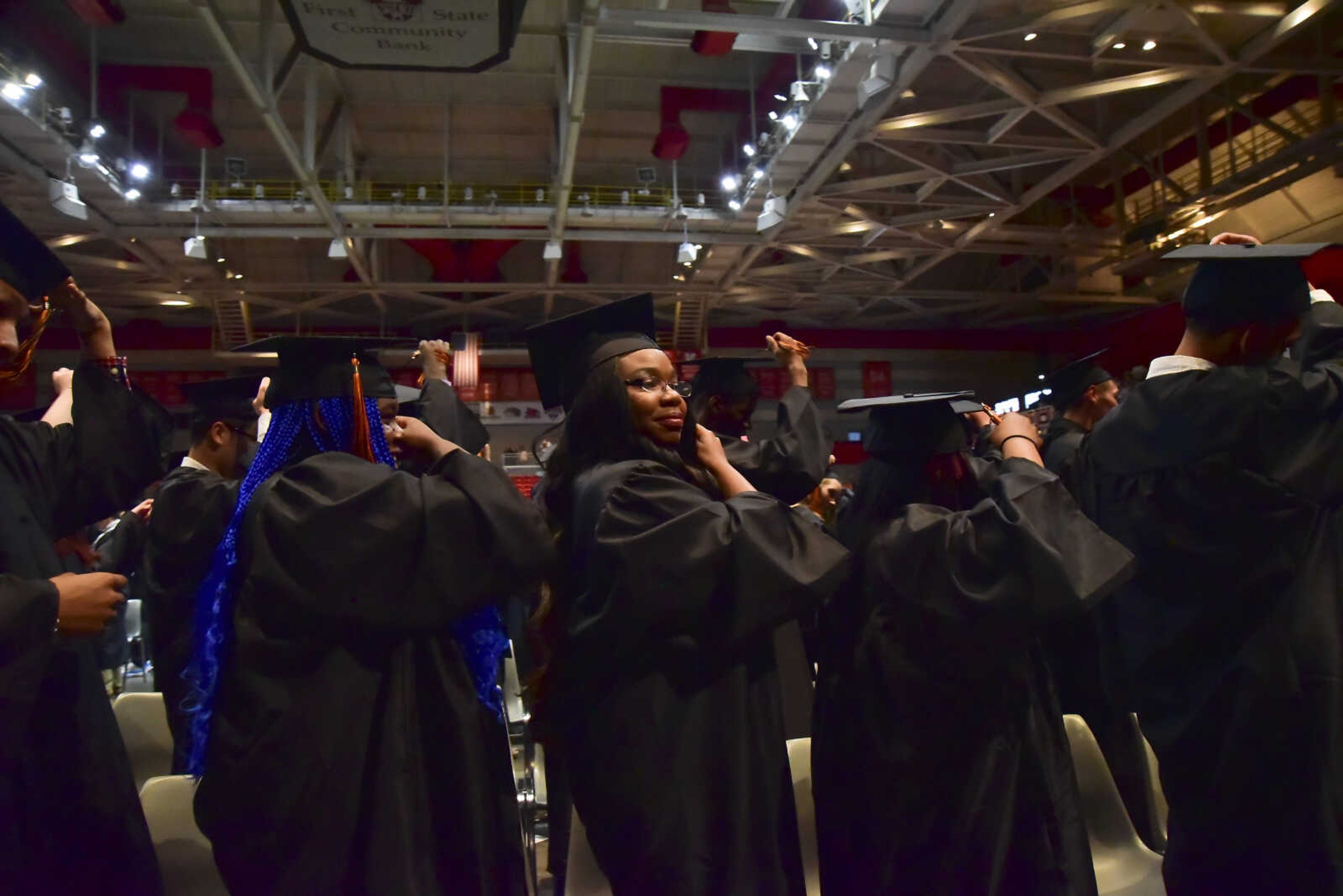 Students turn over their tassels during Cape Girardeau Central High School graduation Sunday, May 14, 2017at the Show Me Center in Cape Girardeau.