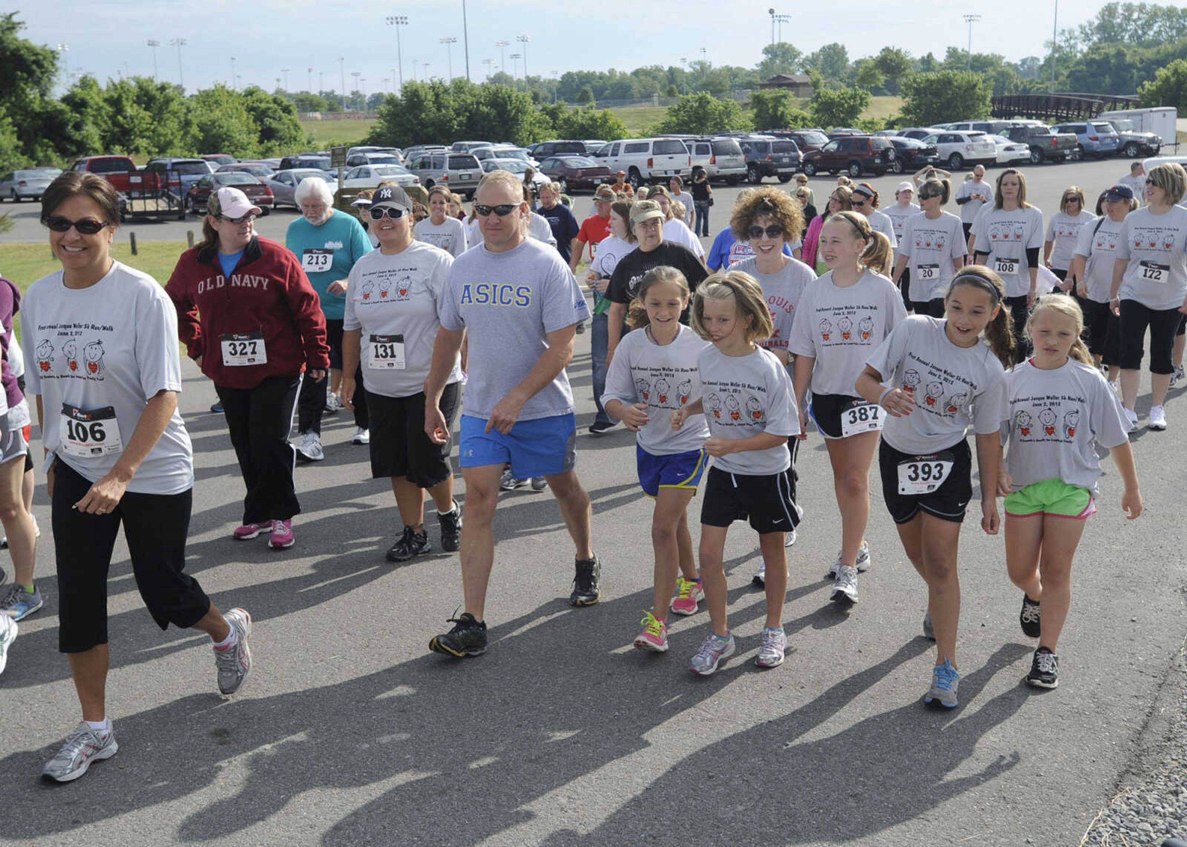 Runners begin the Jacque Waller 5K walk/run.