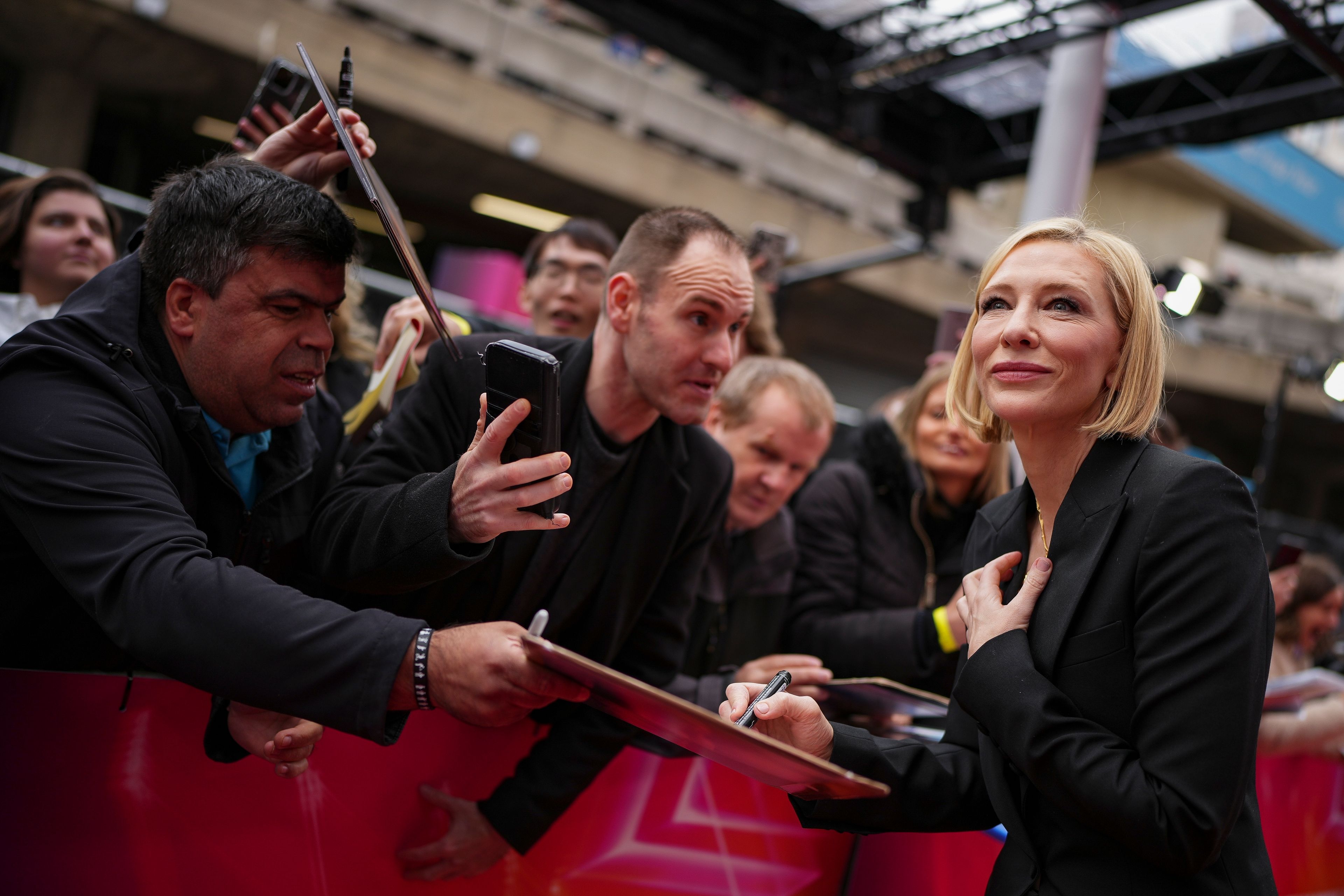 Cate Blanchett signs autographs upon arrival at the premiere for 'Disclaimer' during the London Film Festival on Thursday, Oct. 10, 2024, in London. (Photo by Scott A Garfitt/Invision/AP)